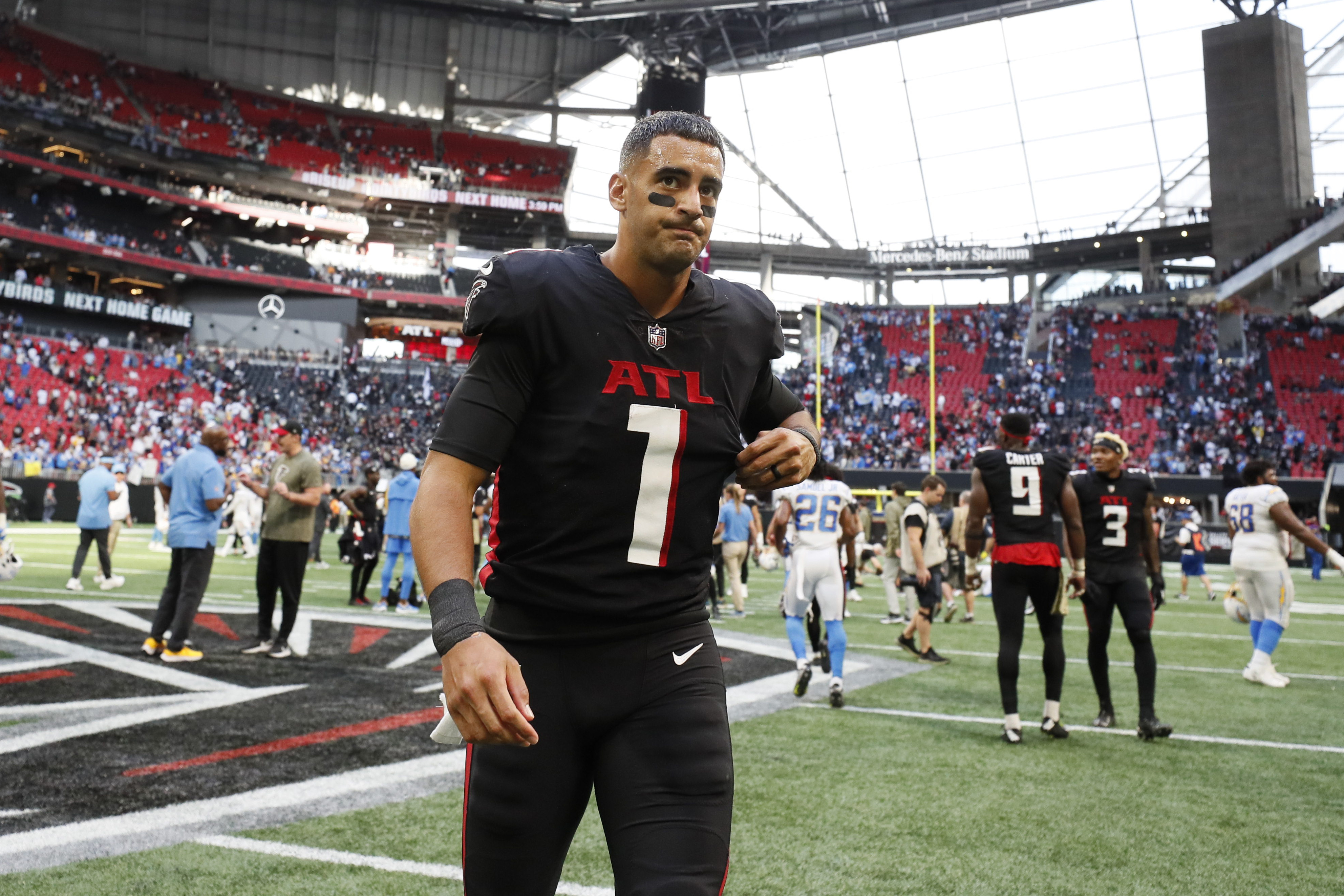 Atlanta Falcons kicker Younghoe Koo (7) walks on the field before an NFL  football game between