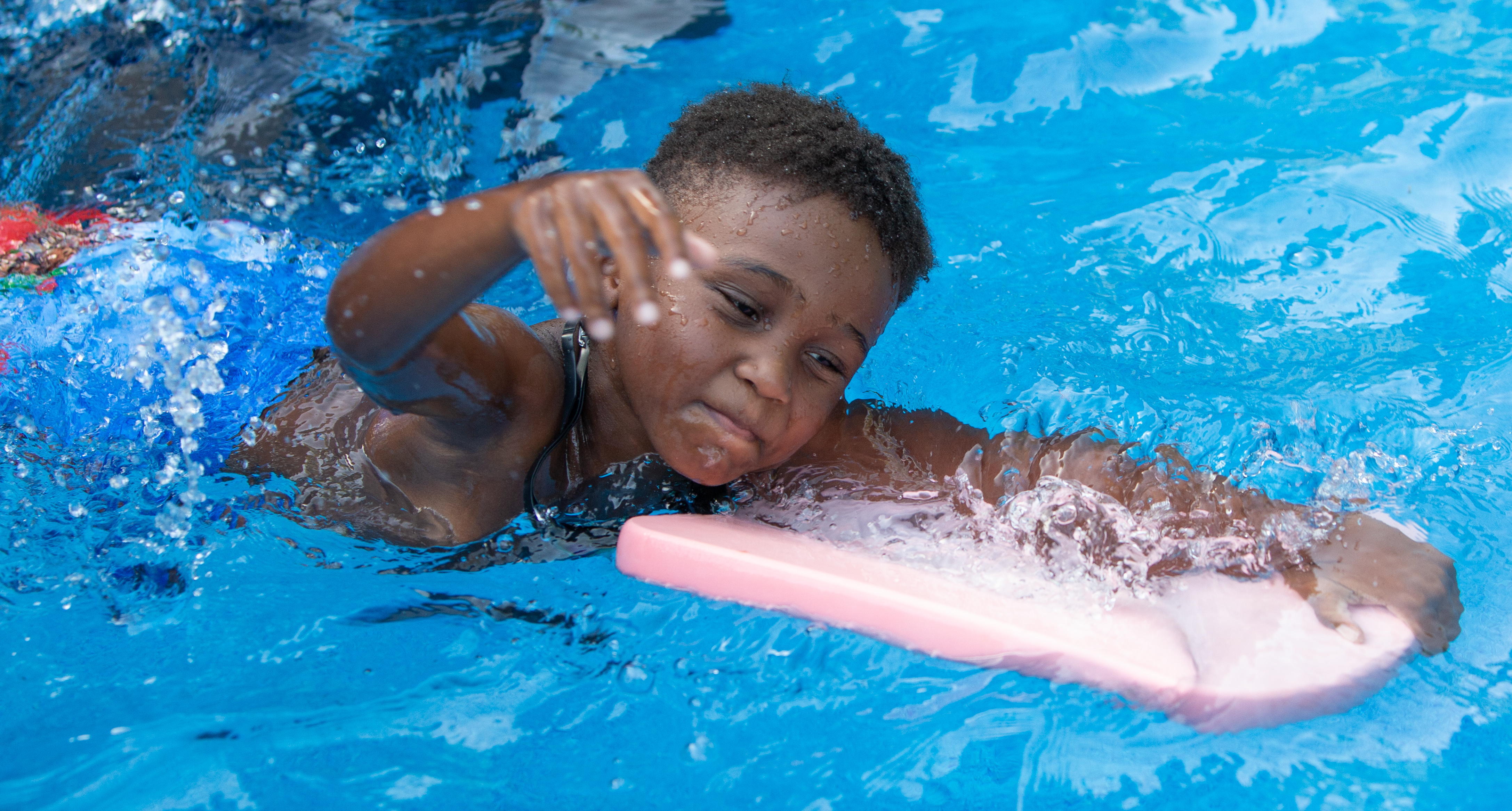 black child swimming