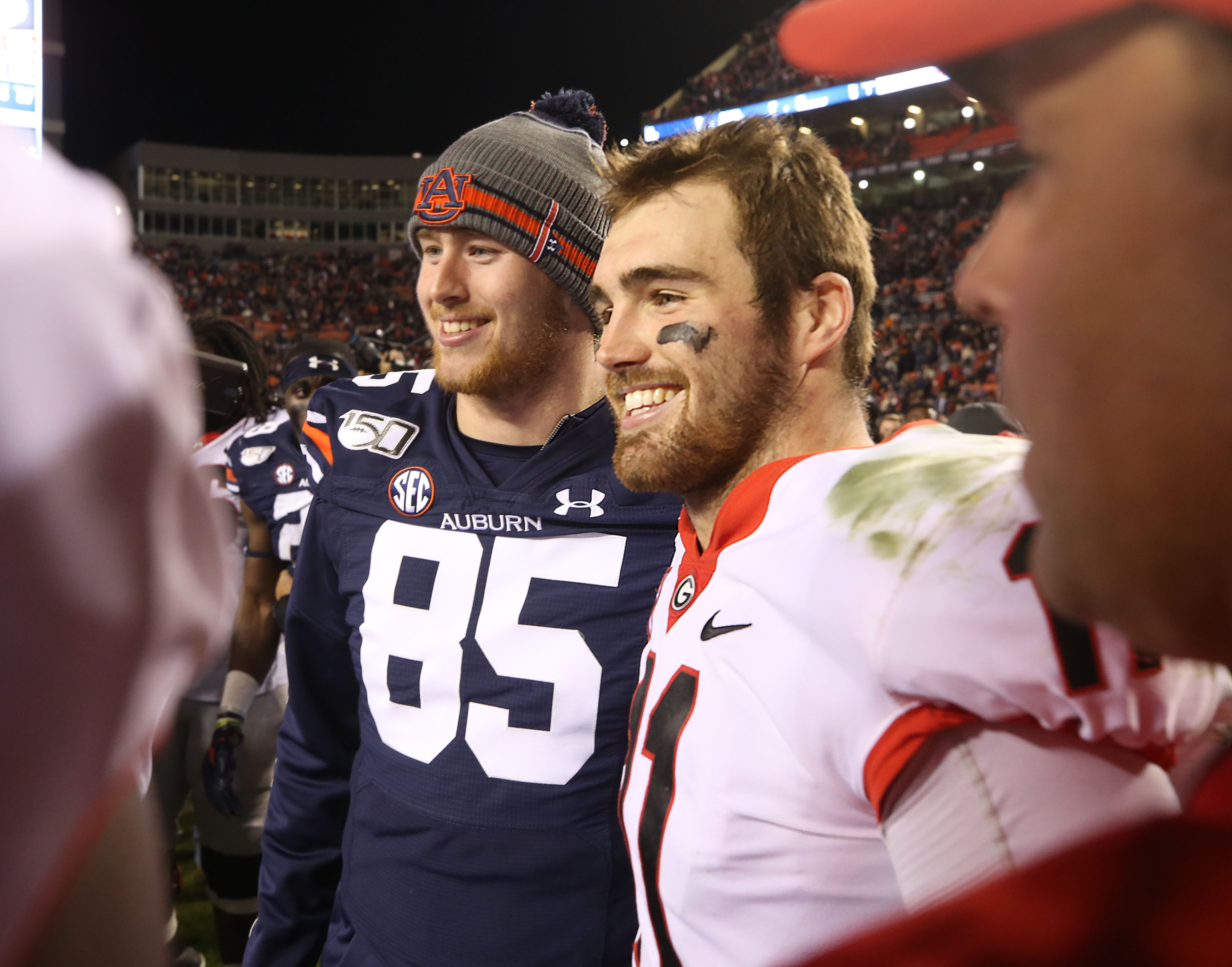 Georgia Bulldogs quarterback Jake Fromm (11) with his brother, Auburn Tigers tight end Tyler Fromm (85). Bob Andres / robert.andres@ajc.com