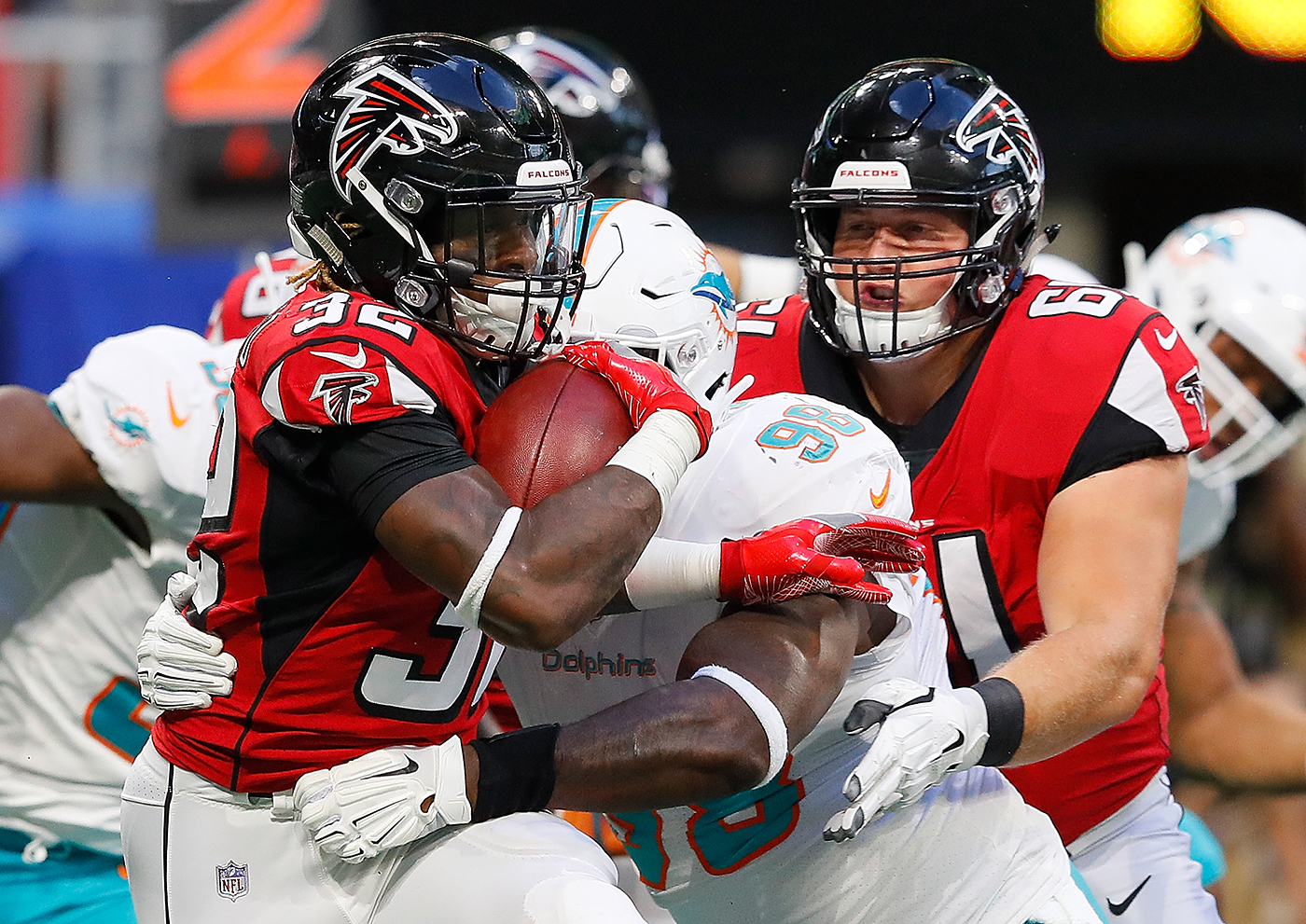 Falcons running back Justin Crawford carries the ball against the Miami Dolphins in a preseason game Aug. 30, 2018.