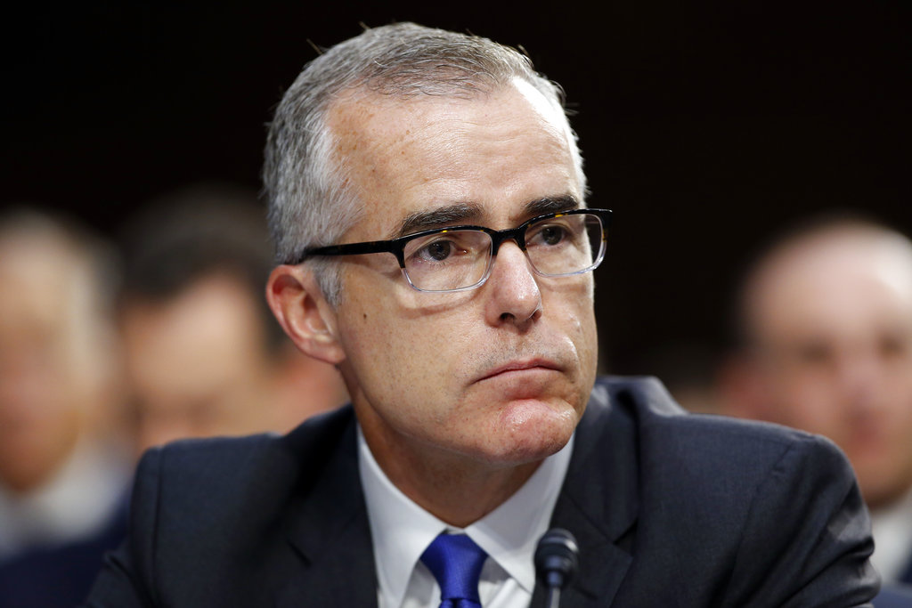 FILE - In this June 7, 2017 file photo, FBI acting director Andrew McCabe listens during a Senate Intelligence Committee hearing about the Foreign Intelligence Surveillance Act, on Capitol Hill in Washington. The Justice Department is reviewing a recommendation that it fire former FBI Deputy Director Andrew McCabe ahead of his forthcoming retirement. Thatâs according to a person familiar with the matter, who spoke on condition of anonymity to discuss an internal disciplinary process. The recommendation was made by the FBIâs Office of Professional Responsibility and was sent to the Justice Department. (AP Photo/Alex Brandon)