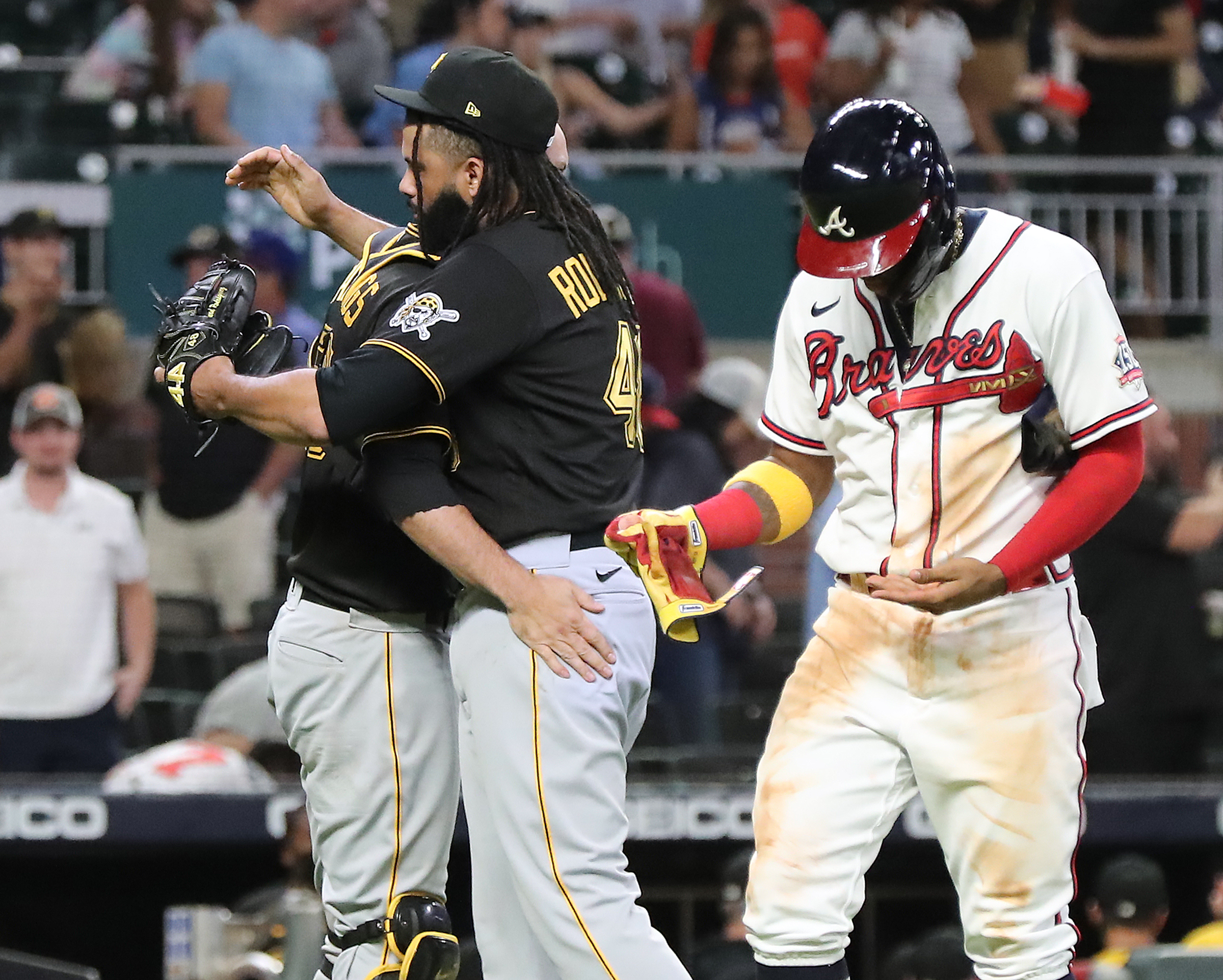 Newman, Frazier push Pirates past Braves 6-4 in 10 innings