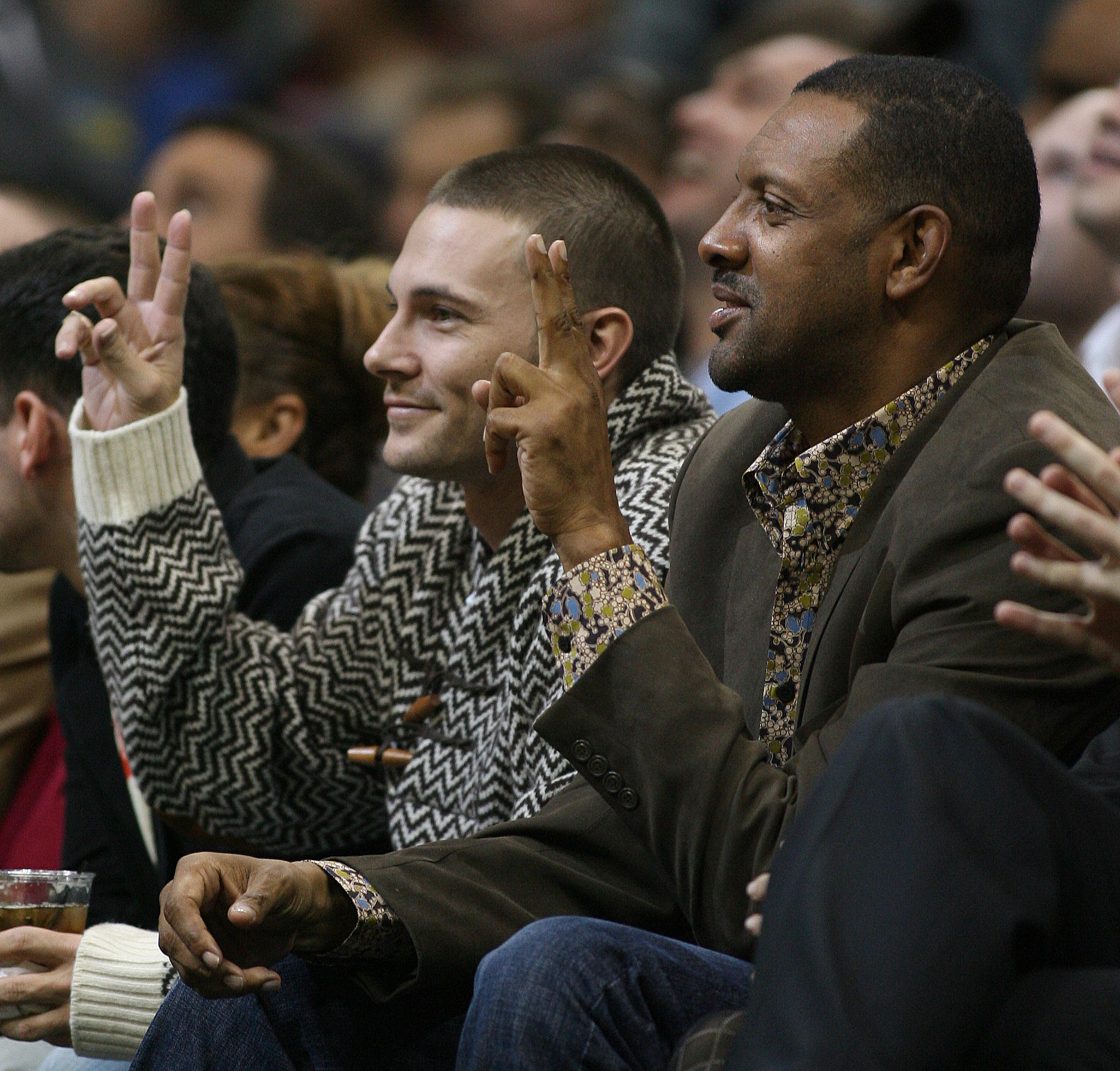 Kevin Federline, soon to be ex husband of Britney Spears, poses with a picture with DeKalb County CEO Vernon Jones on Saturday, November 18, 2006, during the Atlanta Hawks game against the Miami Heat at Phillips Arena. (JOHNNY CRAWFORD / AJC staff)