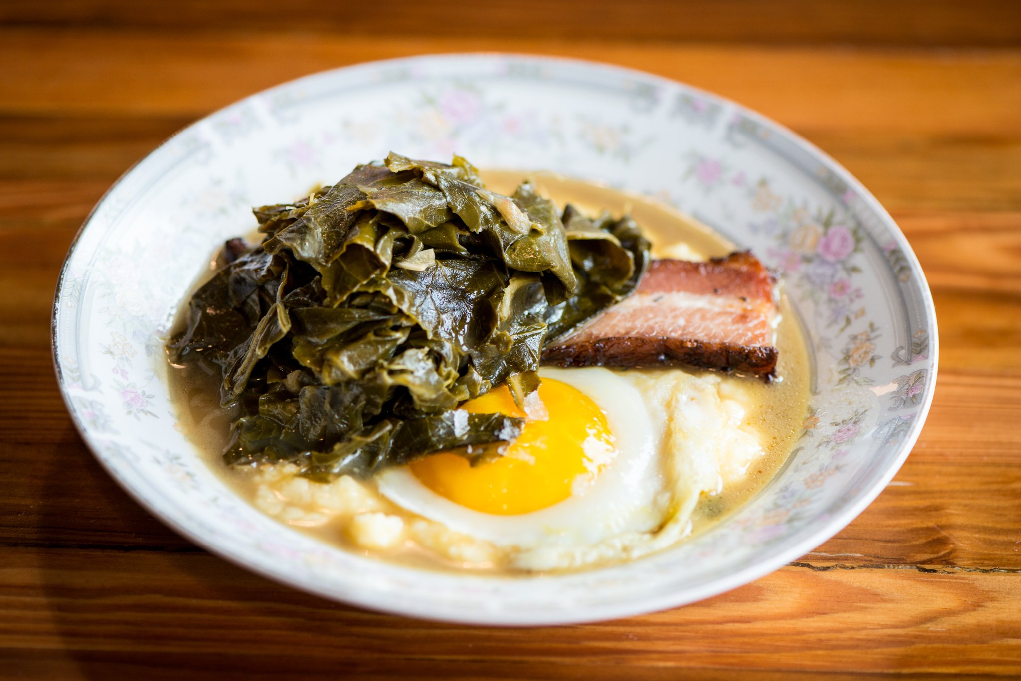 Polenta, Braised Bacon, Egg, Collard Greens, and Potlikker. Photo credit- Mia Yakel.