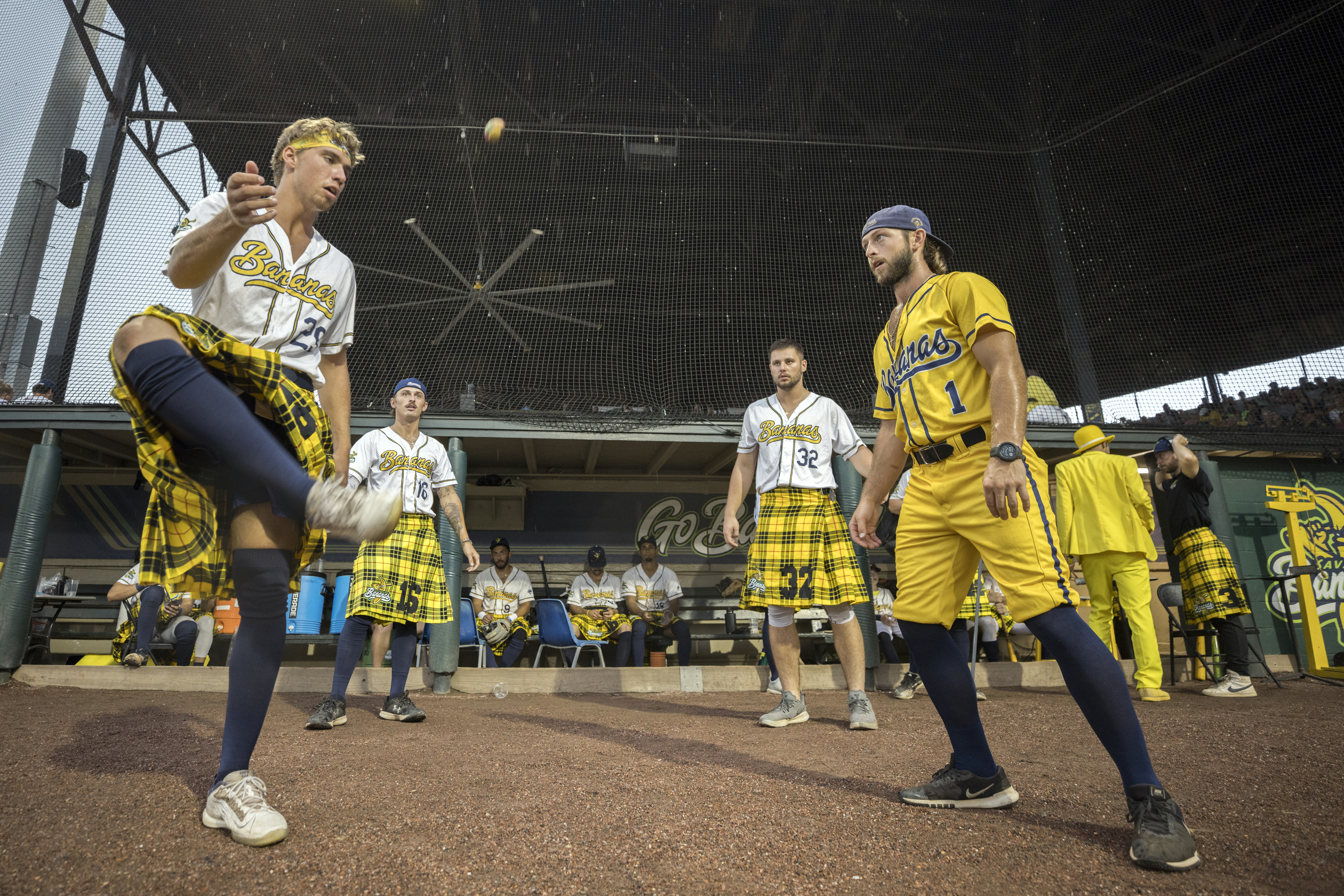 Savannah Bananas pitcher Josh Willitts, left, plays hackey sack with teammates during a rain delay prior to a game with the Holly Springs Salamanders at Historic Grayson Stadium. (AJC Photo/Stephen B. Morton)