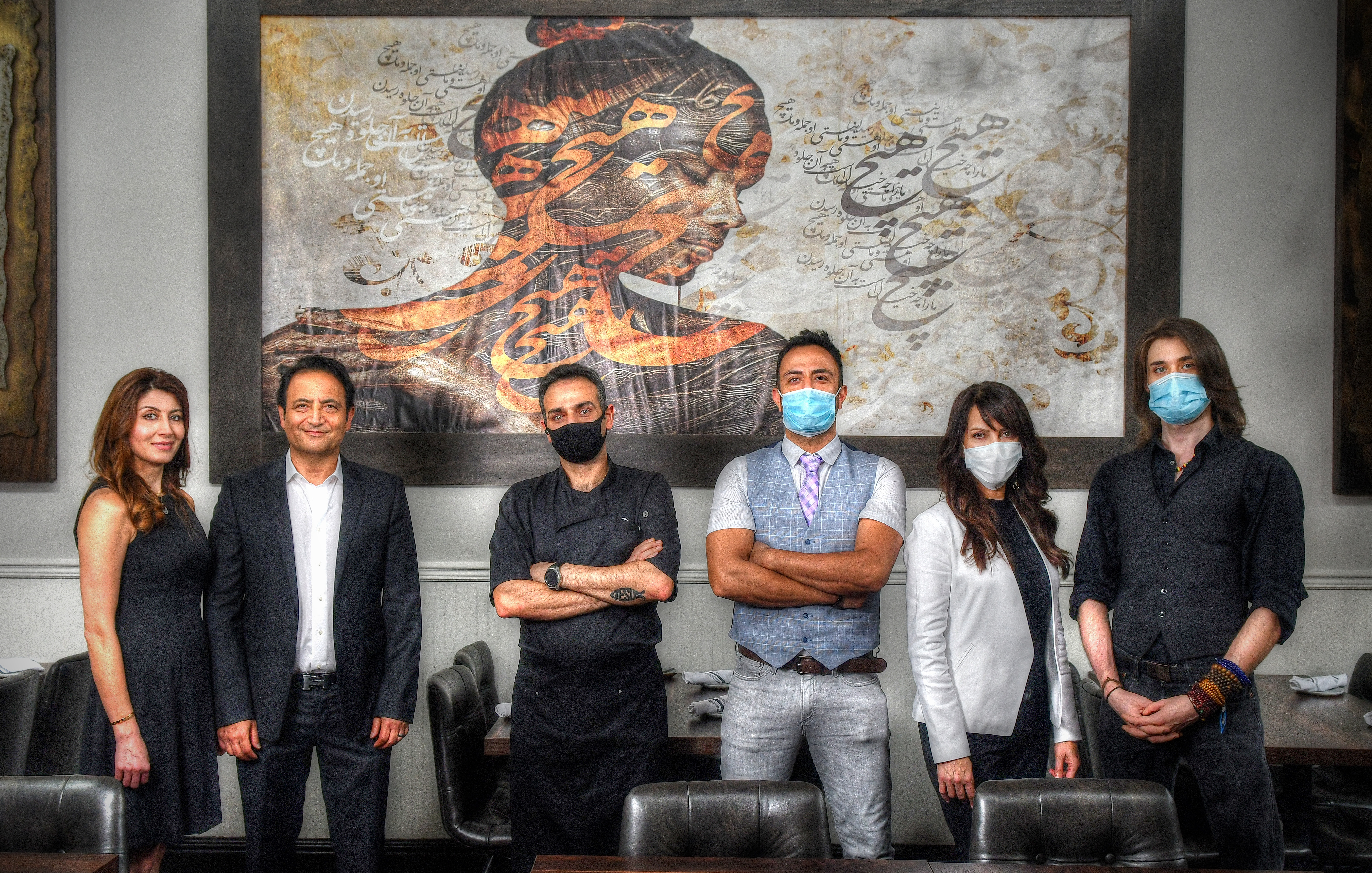 Shown at Persian Basket Kitchen & Bar are (from left) owners and wife and husband, Arezoo Armaghan and Max Lotfi, with Ermiya Rezai (executive chef), Farid Mehrab (front of house manager), Homa Ghasemi (general manager) and Nicholas Vitry (bar manager). Chris Hunt/FOR THE AJC