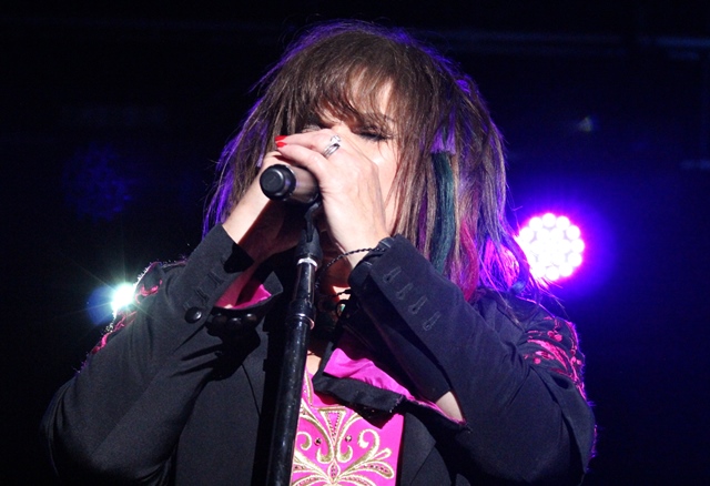 Ann Wilson, winding up. Photo: Melissa Ruggieri/AJC