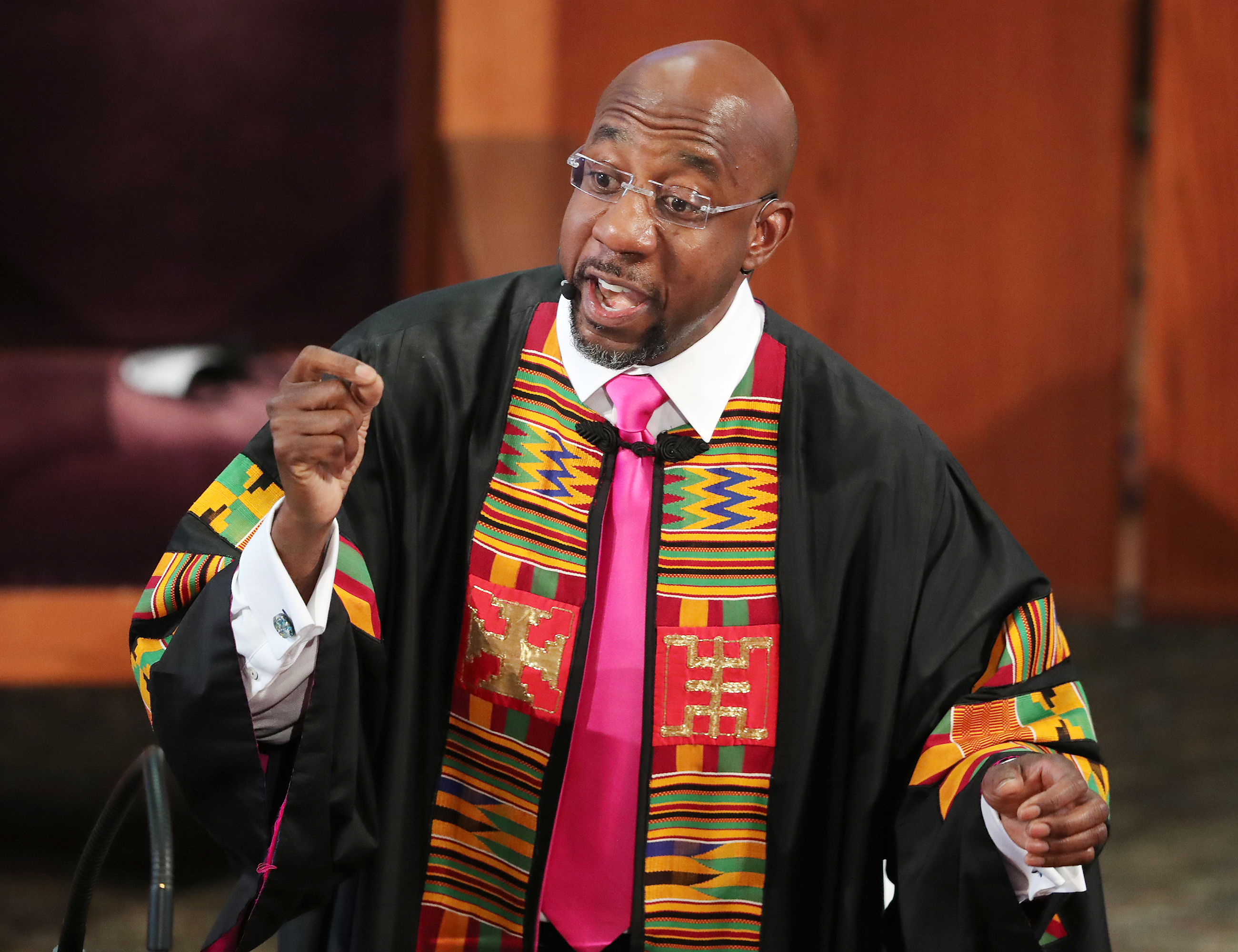 062320 Atlanta: Rev. Raphael G. Warnock delivers the eulogy for Rayshard Brooks at his funeral in Ebenezer Baptist Church on Tuesday, June 23, 2020 in Atlanta. Brooks, 27, died June 12 after being shot by an officer in a Wendyâs parking lot. Brooksâ death sparked protests in Atlanta and around the country. Warnock, senior pastor of Ebenezer, said âRayshard Brooks wasnât just running from the police. He was running from a system that makes slaves out of people. A system that doesnât give ordinary people whoâve made mistakes a second chance, a real shot at redemption.â Curtis Compton ccompton@ajc.com
