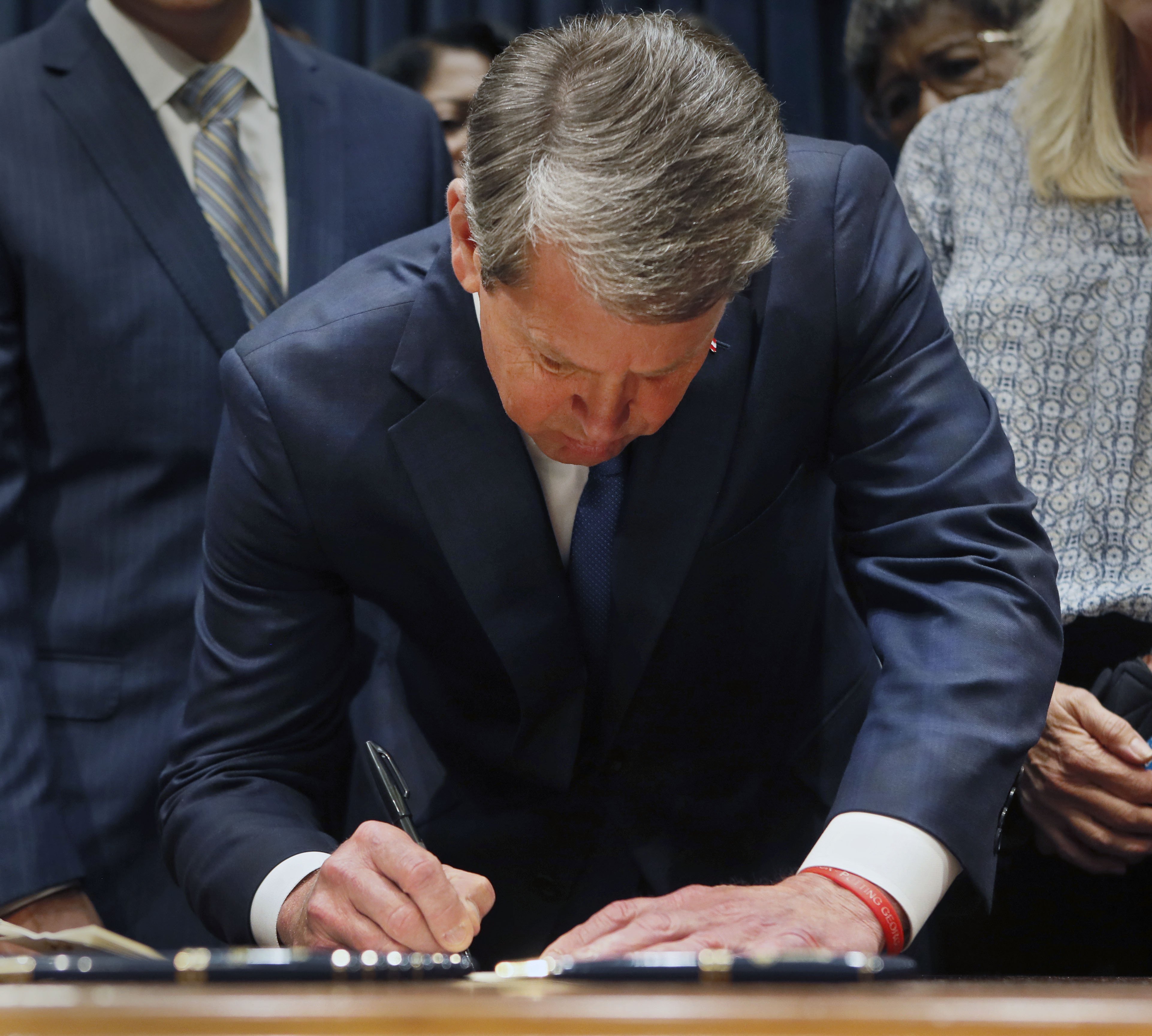 May 7, 2019 - Atlanta - Surrounded by supporters of the bill, Gov. Brian Kemp signed HB 481, the "heartbeat bill", on Tuesday, setting the stage for a legal battle as the state attempts to outlaw most abortions after about six weeks of pregnancy. The bill, sponsored by Rep. Ed Setlzer, R-Acworth, and carried in the Senate by Sen. Renee Unterman, R - Buford, outlaws most abortions once a doctor can detect a fetus' heartbeat - usually around six weeks of pregnancy. Bob Andres / bandres@ajc.com