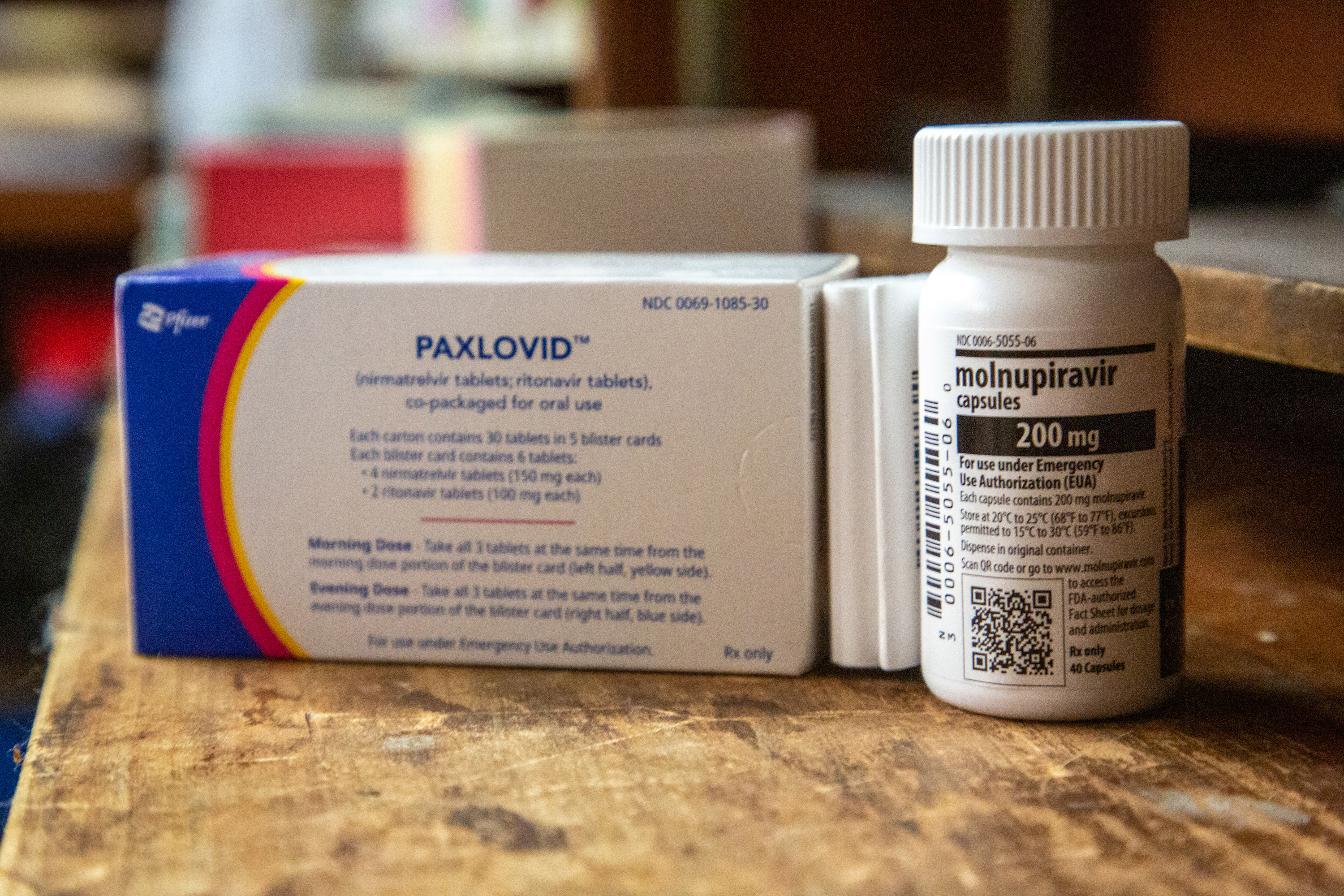 The two new antivirals - molnupiravir and Paxlavoid, sit on the counter of Chapman Drug, a pharmacy in Hapeville, Thursday, February 3, 2022. STEVE SCHAEFER FOR THE ATLANTA JOURNAL-CONSTITUTION