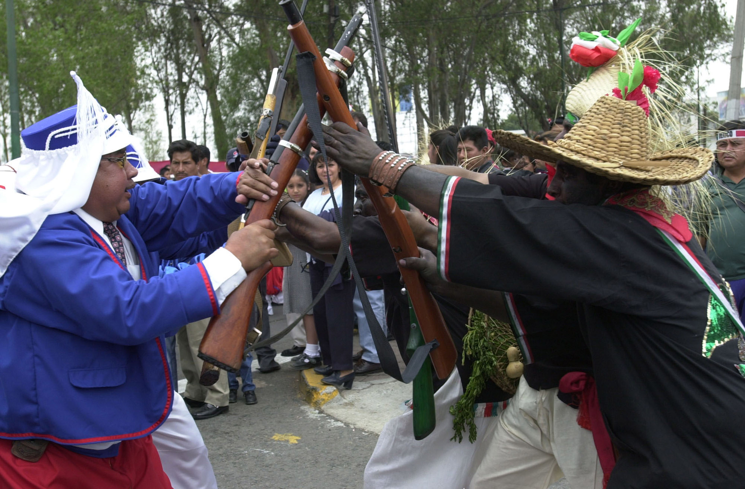Mexicans celebrate Cinco de Mayo with a reenactment of the 1862 battle between the French and the Zacapuaxtlas Indians May 5, 2001 in Puebla, Mexico.