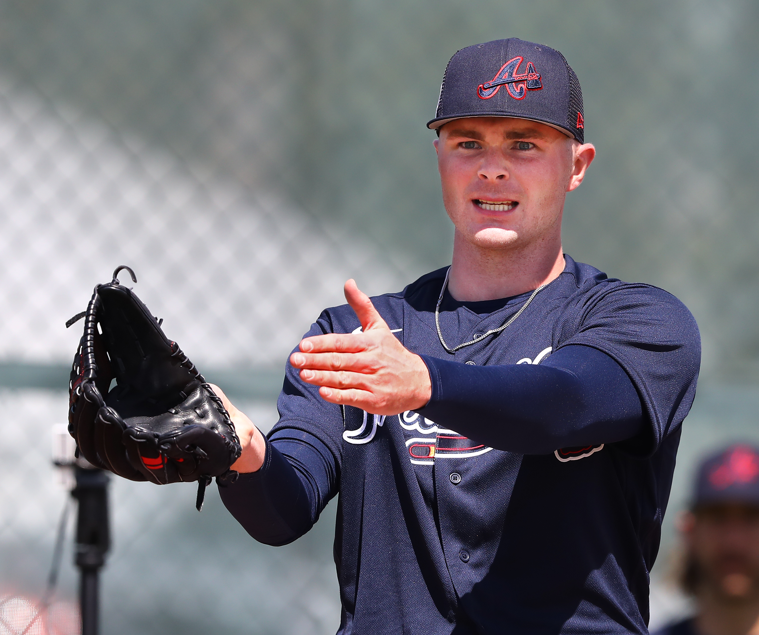 031422 North Port: Atlanta Braves pitcher Sean Newcomb reacts after a pitch from the practice mounds during team practice at Spring Training on Monday, March 14, 2022, in North Port. “Curtis Compton / Curtis.Compton@ajc.com”`