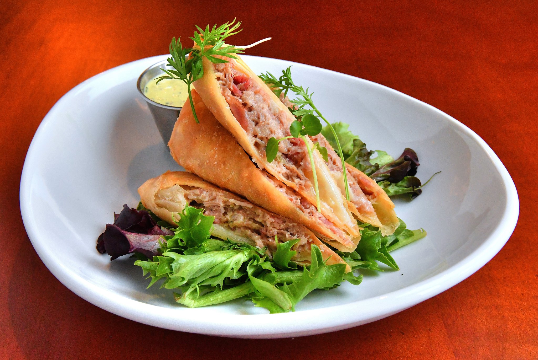 Cuban Spring Rolls with Cilantro-mustard sauce. (Contributed by Chris Hunt Photography)