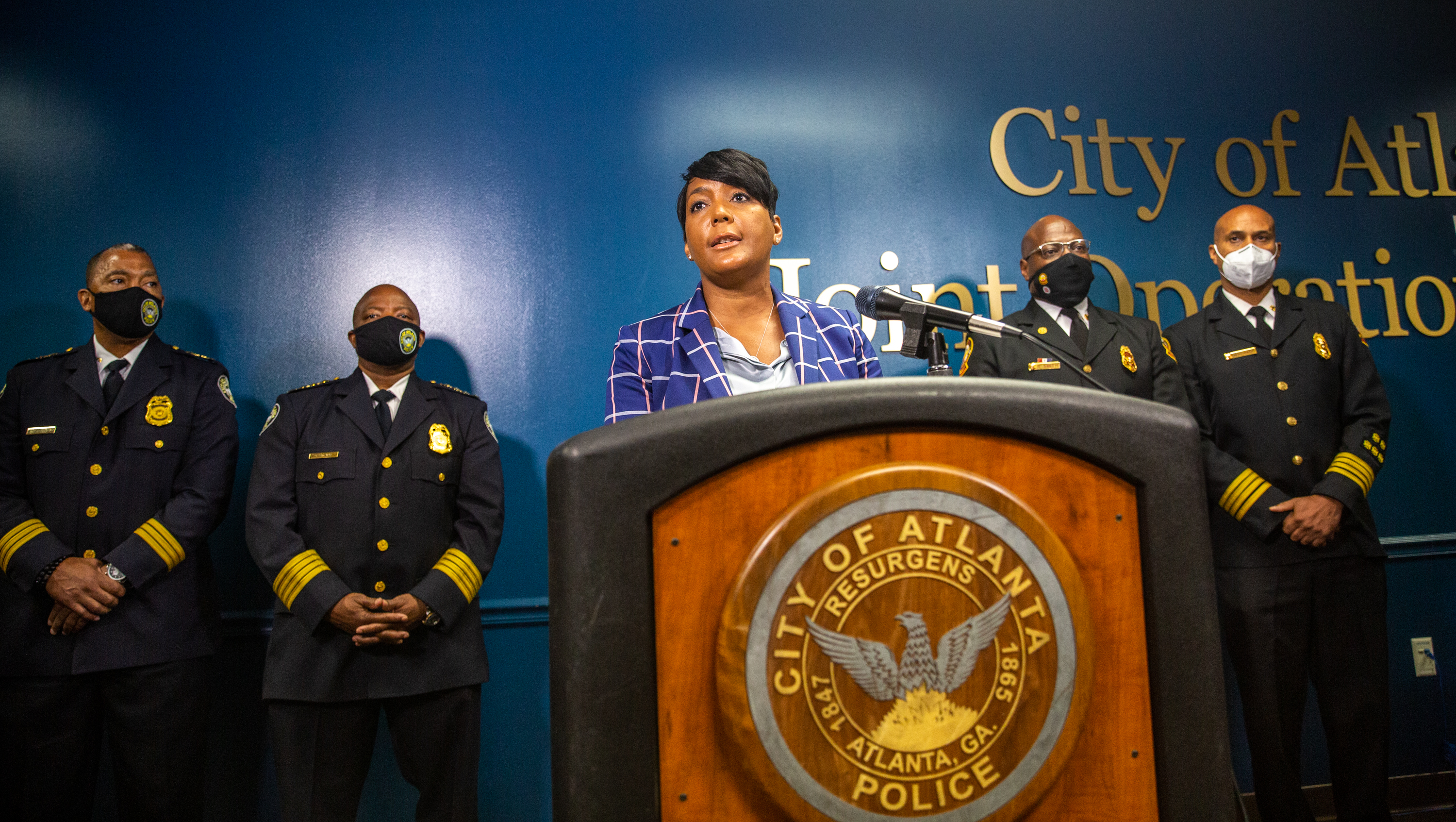 After the approval vote of the Public Safety Training Center this week, Mayor Mayor Keisha Lance Bottoms, Atlanta Police Chief Rodney Bryant, Chief Rod Smith of the Atlanta Fire Rescue Department and Dave Wilkinson of the Atlanta Police Foundation address questions about the facility, it's location and the concerns of the community Thursday, Sept 9, 2021. (Jenni Girtman for The Atlanta Journal-Constitution)