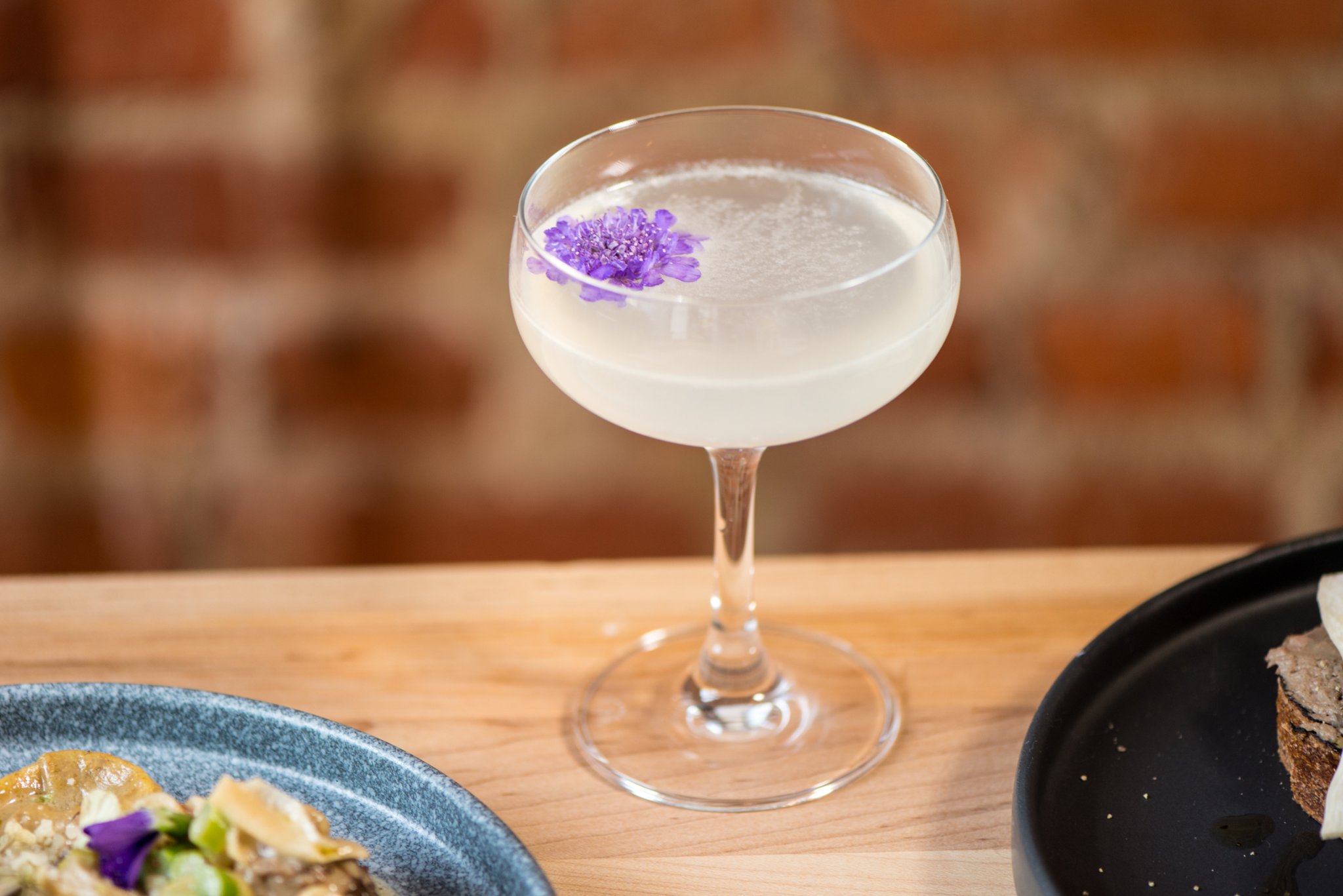 Pisco My Heart cocktail with Macchu Pisco, Uncle Val's Botanical Gin, chamomile, lemon. Photo credit- Mia Yakel.