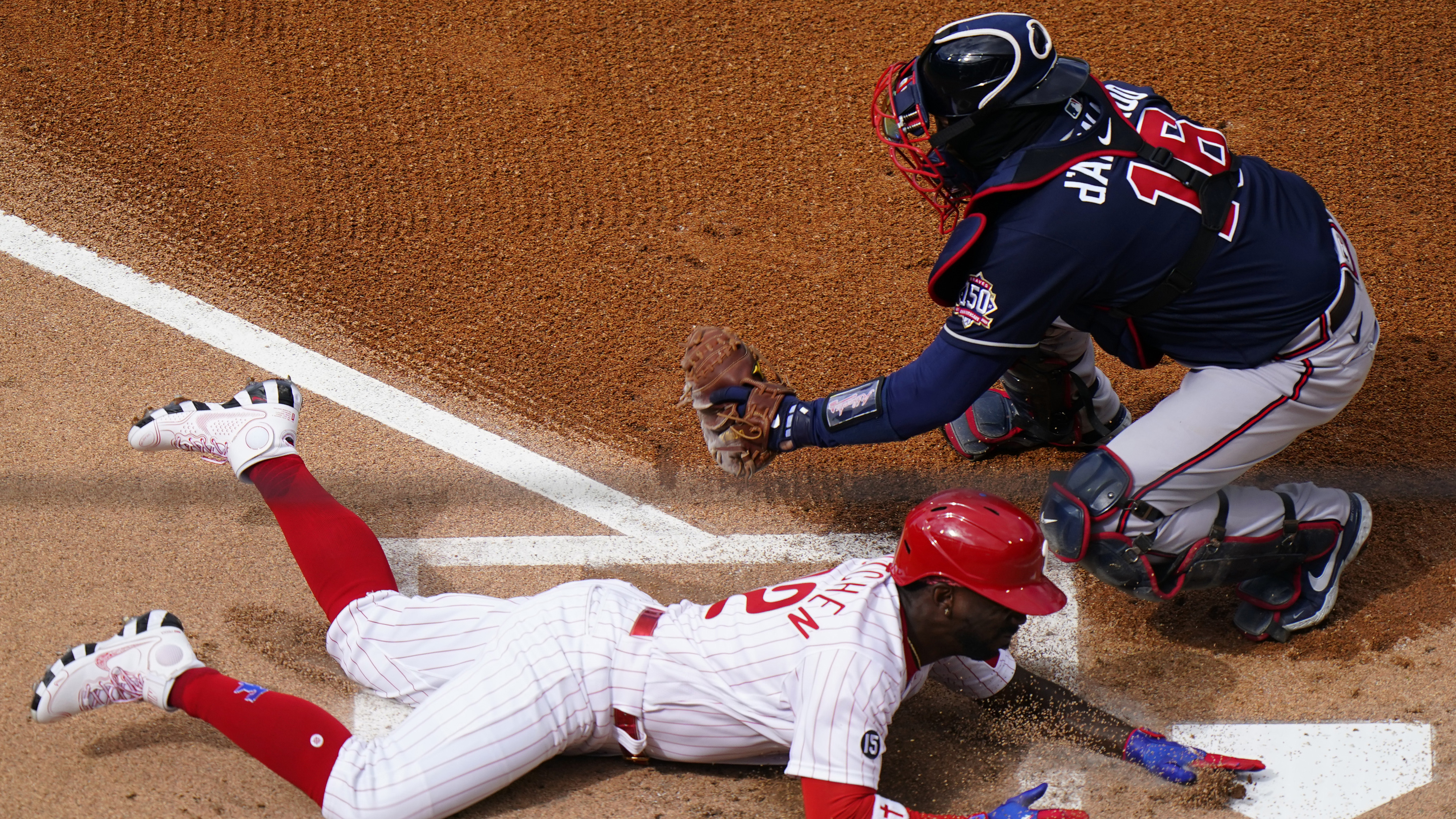 Braves' Travis d'Arnaud jokingly reacts to being hit by pitch from