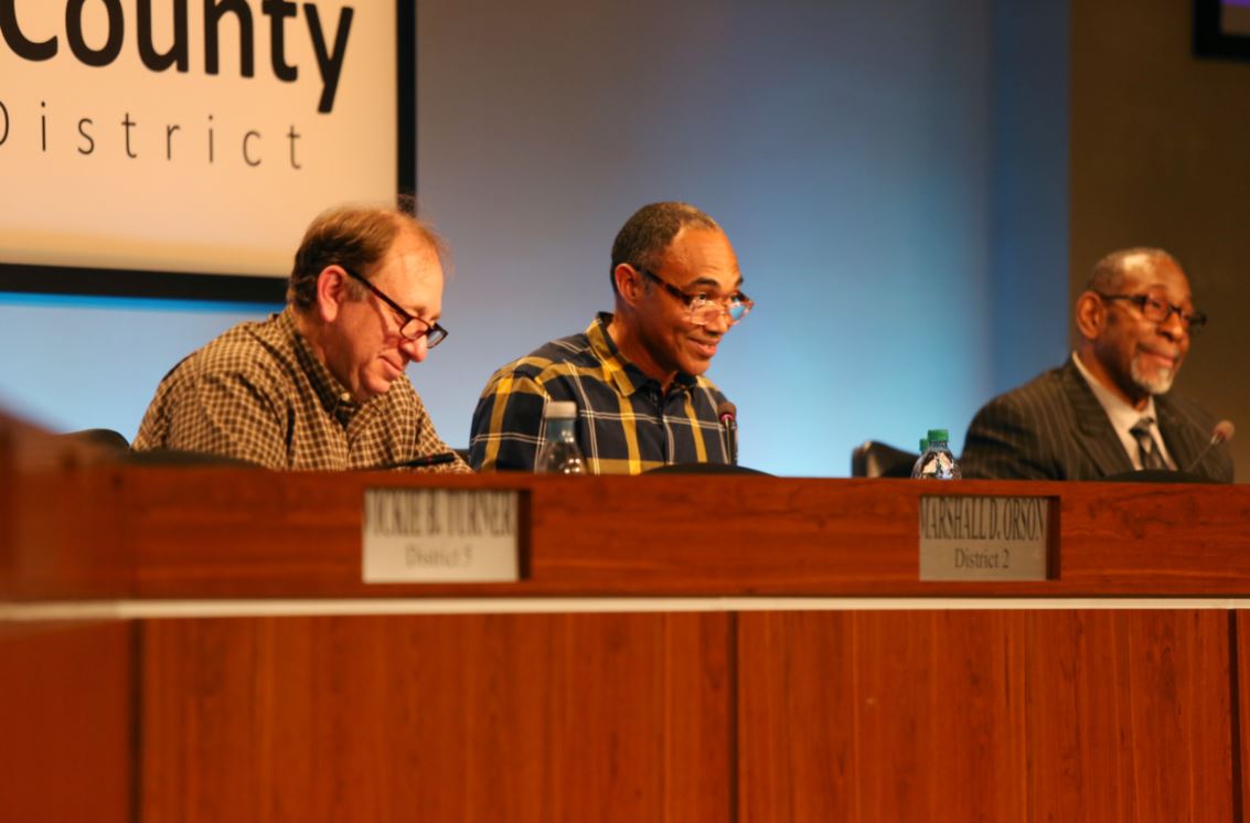 From left, DeKalb County Board of Education Vice Chair Marshall Orson, Chairman Michael Erwin and DeKalb County School District Superintendent Steve Green listen during a recent board meeting. AJC FILE PHOTO
