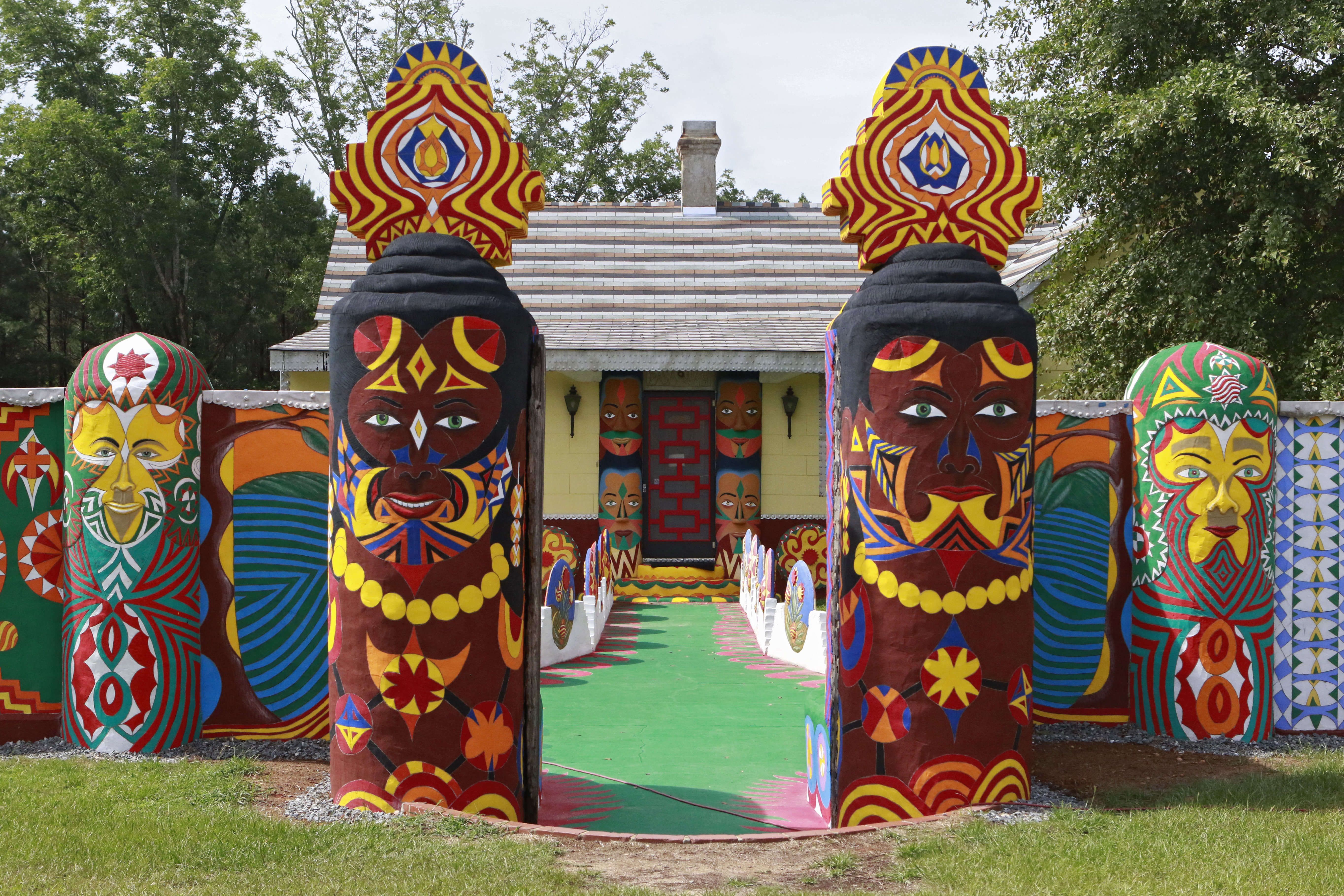 The vibrantly restored entrance to Pasaquan, with painted totems that appear throughout the site. Pasaquan is an art installation created by the late visionary artist Eddie Owens Martin in Buena Vista. Bob Andres / bandres@ajc.com