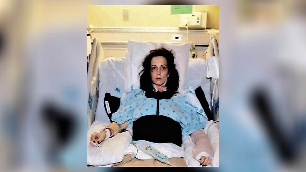 After Ronald Goss shot her seven times in February 2018, Tina Davis woke up unable to move her legs. Doctors told her that she may never walk again.
