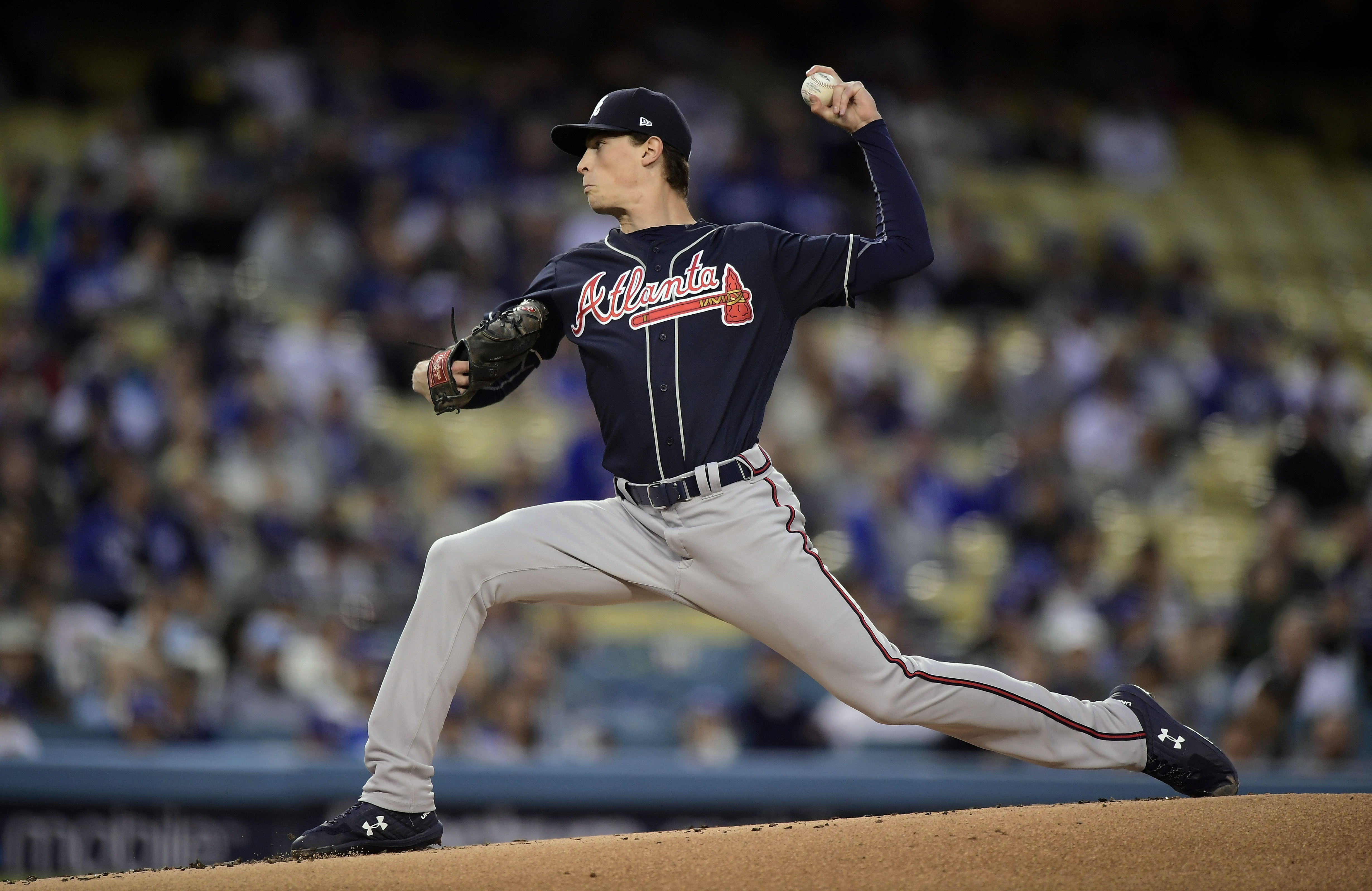 Video: Max Fried smacks his head on ground after making throw