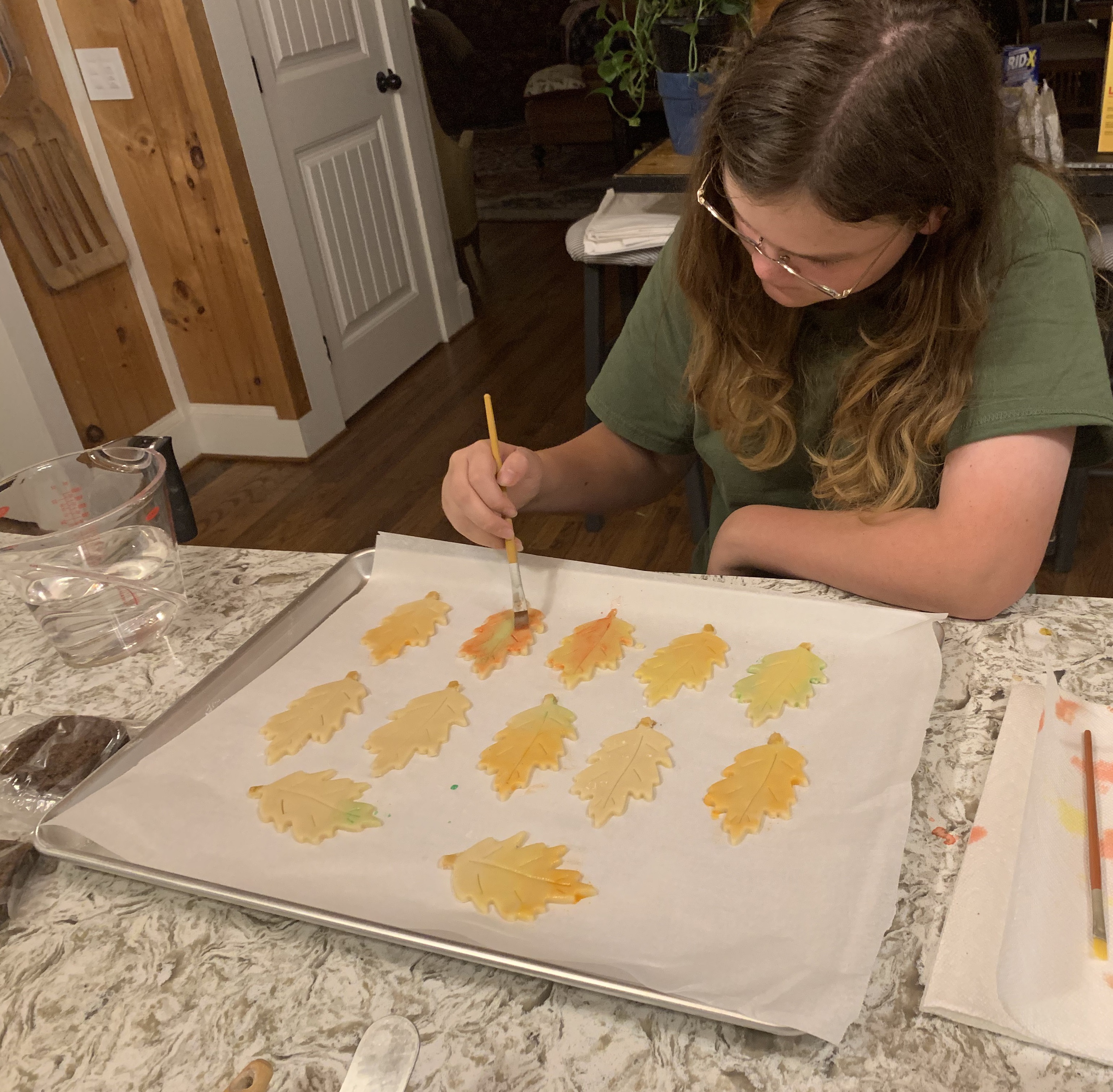 A love of baking and decorating cookies has passed along to the third generation. Gigi Little, Jen Leitheit-Little’s daughter, employs her artistic skills in painting cookies. (Courtesy of Jen Leitheit-Little)