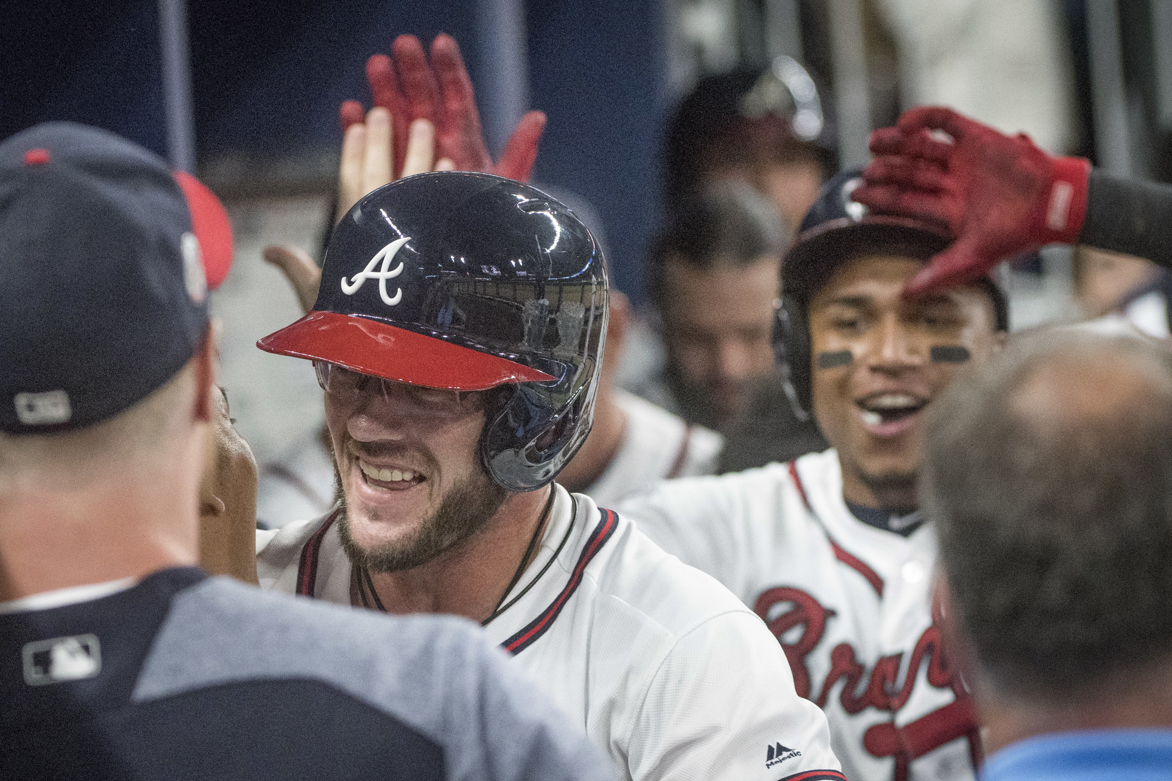 Yasiel Puig homers again as Dodgers beat Braves in 10