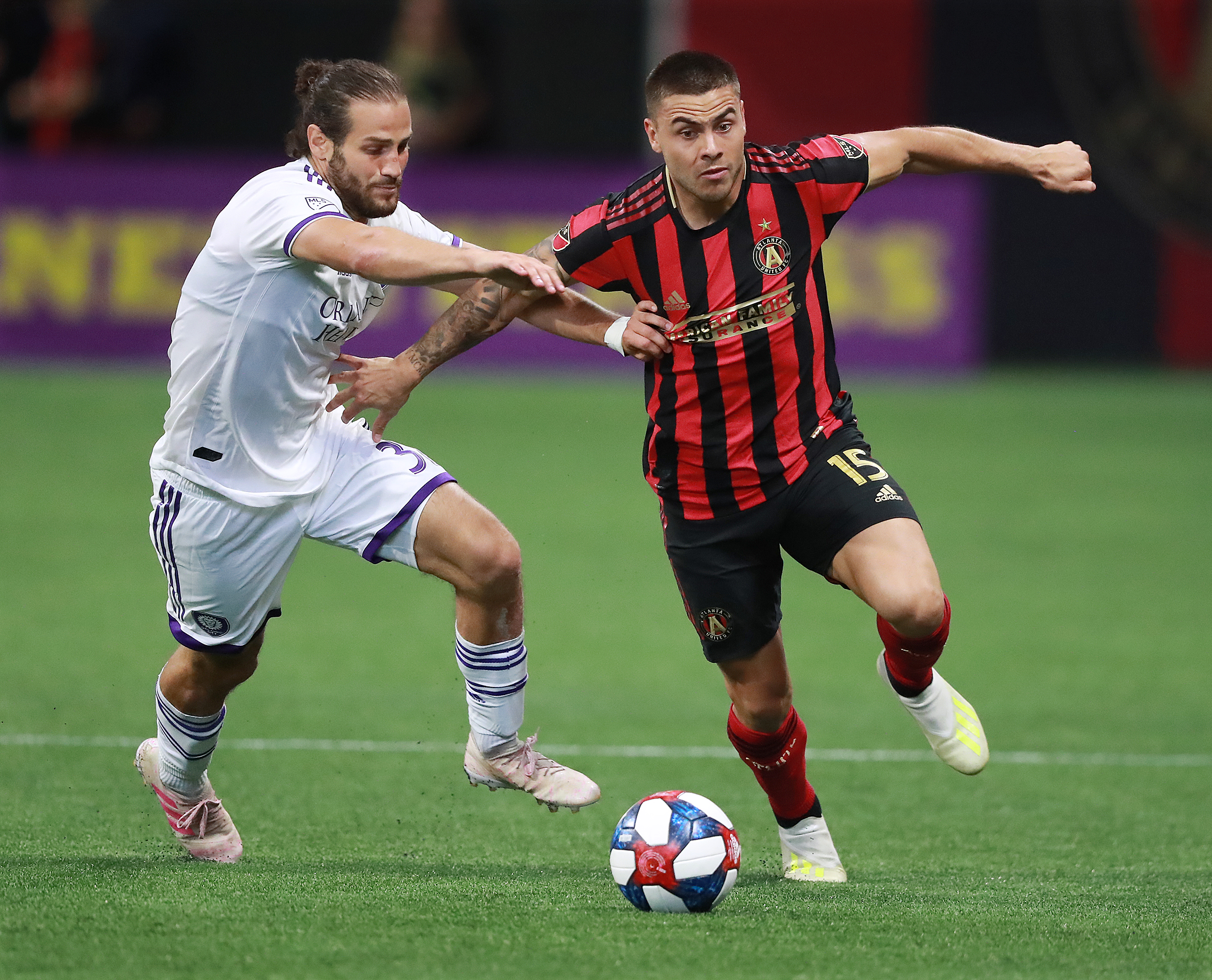 May 12, 2019 Atlanta: Atlanta United forward Hector Villalba drives past Orlando City defender Alex De John during the second half in a 1-0 victory during a MLS soccer match on Sunday, May 12, 2019, in Atlanta. Curtis Compton/ccompton@ajc.com