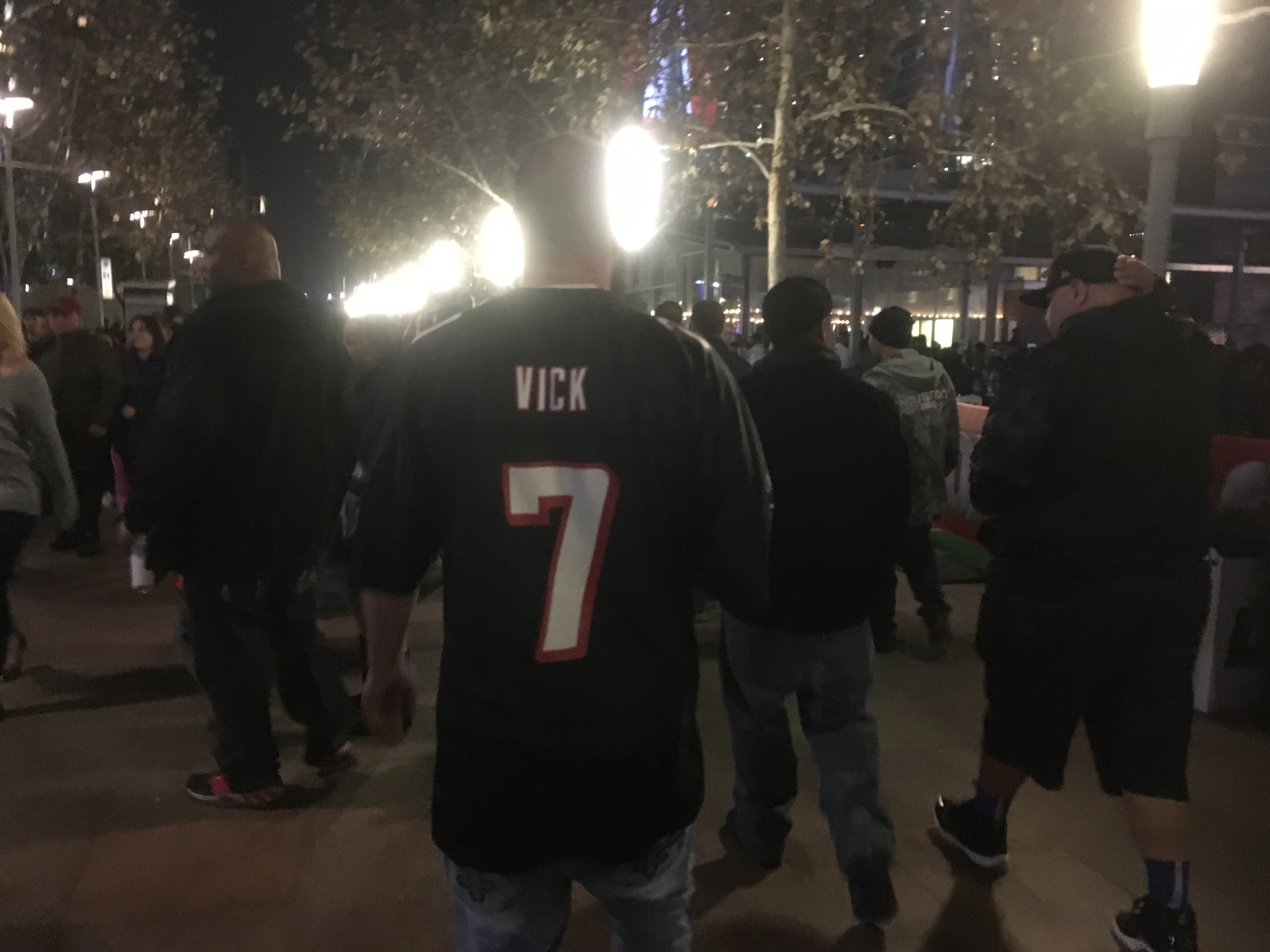 A few Super Bowl fans wear Michael Vick jerseys, all these years