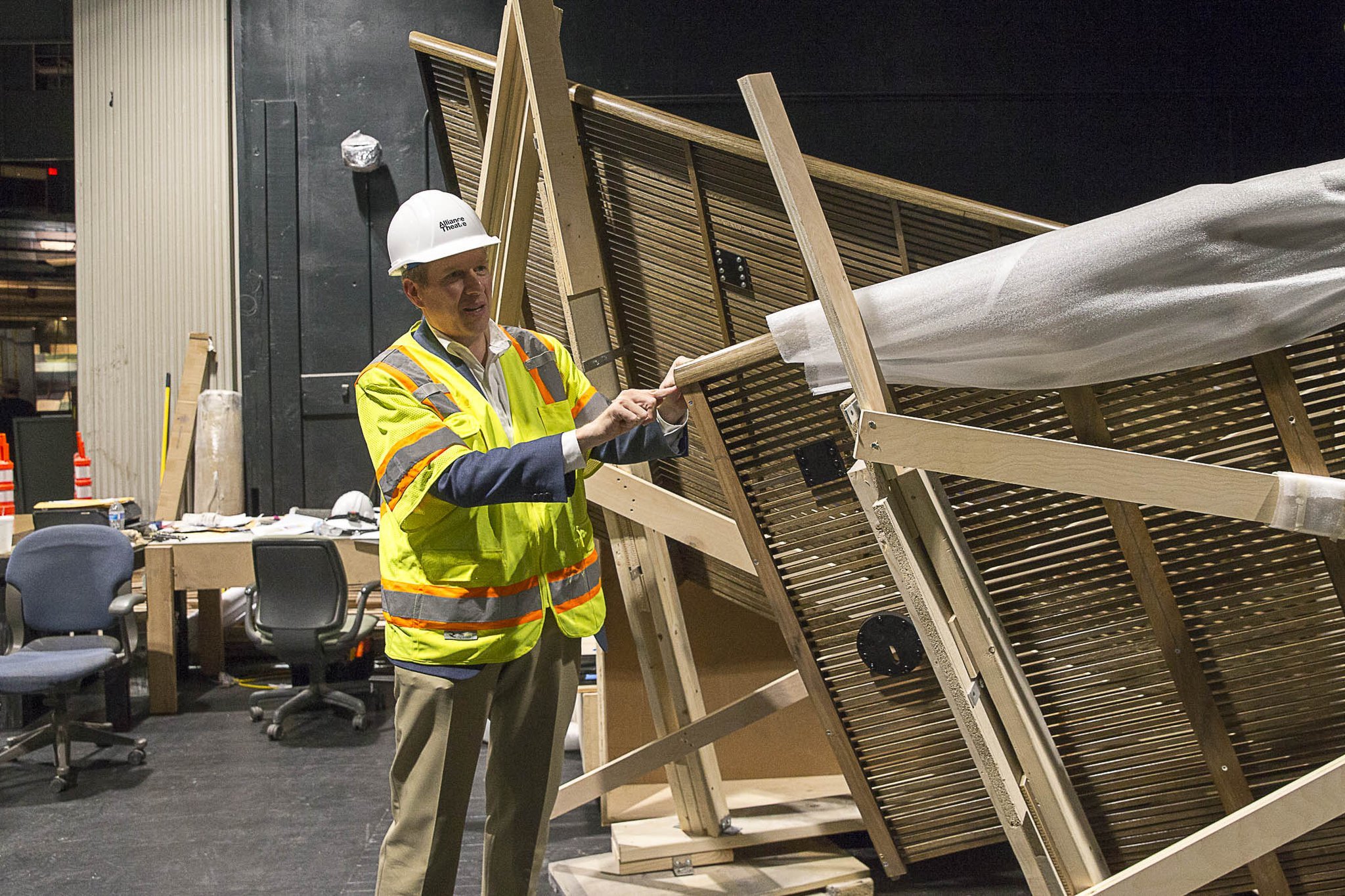 Alliance Theatre managing director Mike Schleifer explains how craftsmen in New Hampshire create the bent-wood panels that are then shipped to Atlanta. Some panels won’t be installed until later this year, he said. ALYSSA POINTER/ALYSSA.POINTER@AJC.COM