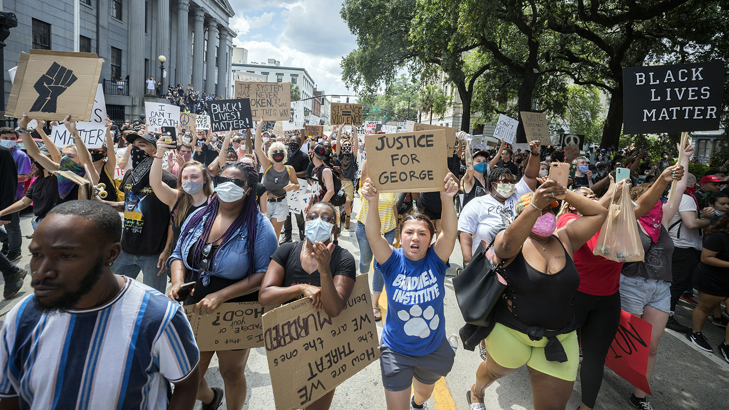 SAVANNAH, GA - MAY 31, 2020: Nearly a 1,000 protesters chant for justice for George Floyd during a peaceful rally and march in the Historic District of downtown Savannah Saturday. (AJC Photo/Stephen B. Morton)