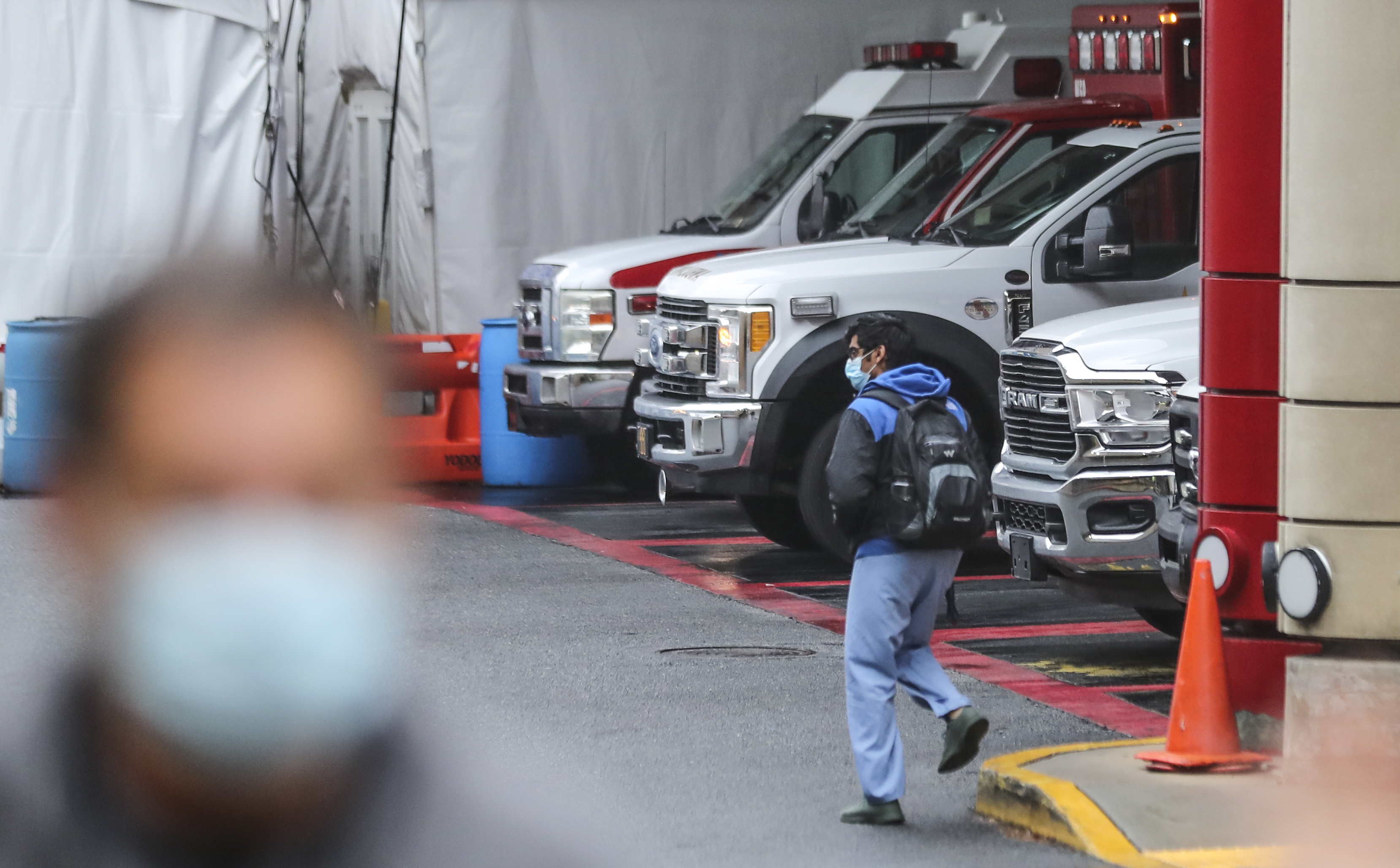 The ambulance bay at Grady EMS was full Friday morning. Concerns from a surge of COVID-19 cases has health officials alarmed. (John Spink / John.Spink@ajc.com)