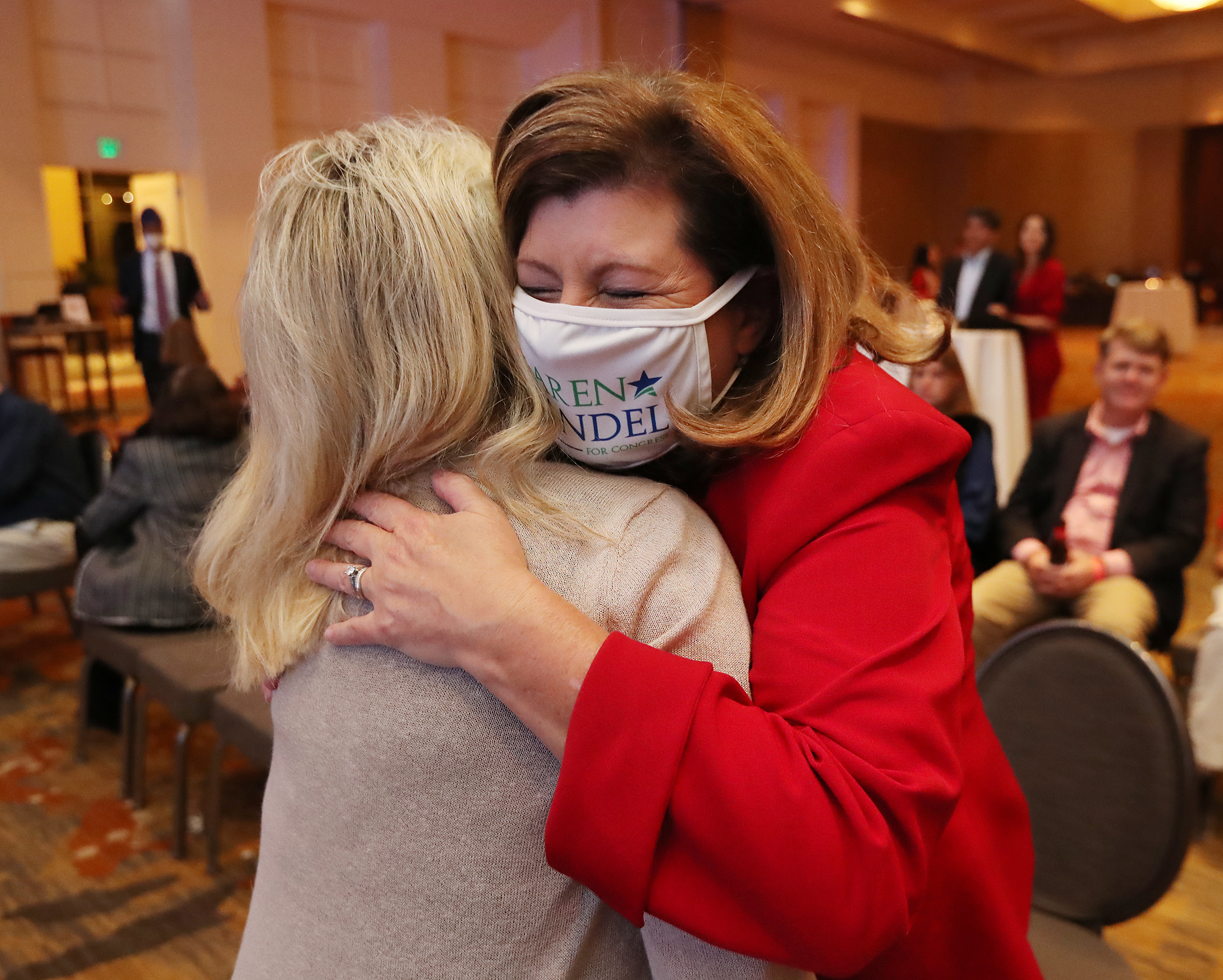 110320 Atlanta: Karen Handel, 6th congressional district candidate, hugs supporter Linda Schutter at the Georgia Republican Party Election Night Celebration in the Intercontinental Buckhead Atlanta hotel on Tuesday, Nov 3, 2020 in Atlanta. “Curtis Compton / Curtis.Compton@ajc.com”