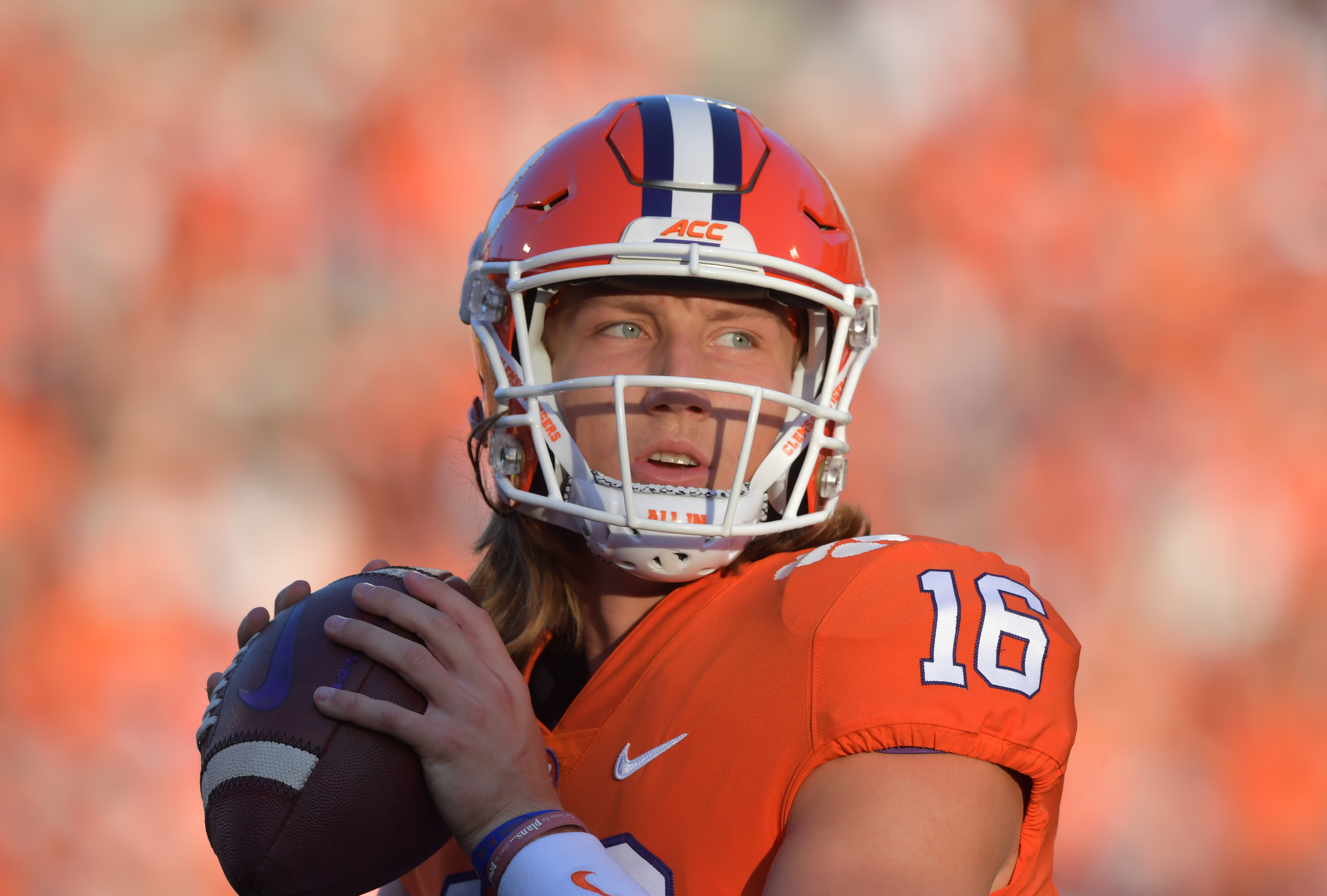 Clemson's Trevor Lawrence wants to play amid COVID-19 dilemma