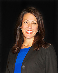 Christi Hildebrand, principal of Newnan's Elm Street Elementary, faces a lawsuit for allegedly putting students with special needs in danger by failing to report to police that their teach was accused of abusing them.