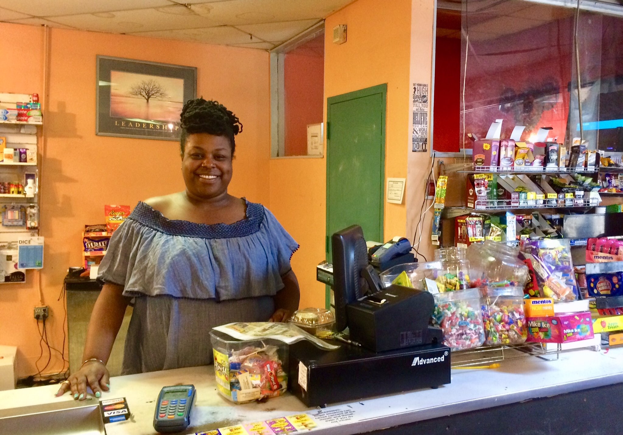 Chloe Floyd runs the grocery store at Floyd’s Plaza in Pittsburgh. She says the family gets lots of offers from investors but is not interested. Photo by Bill Torpy