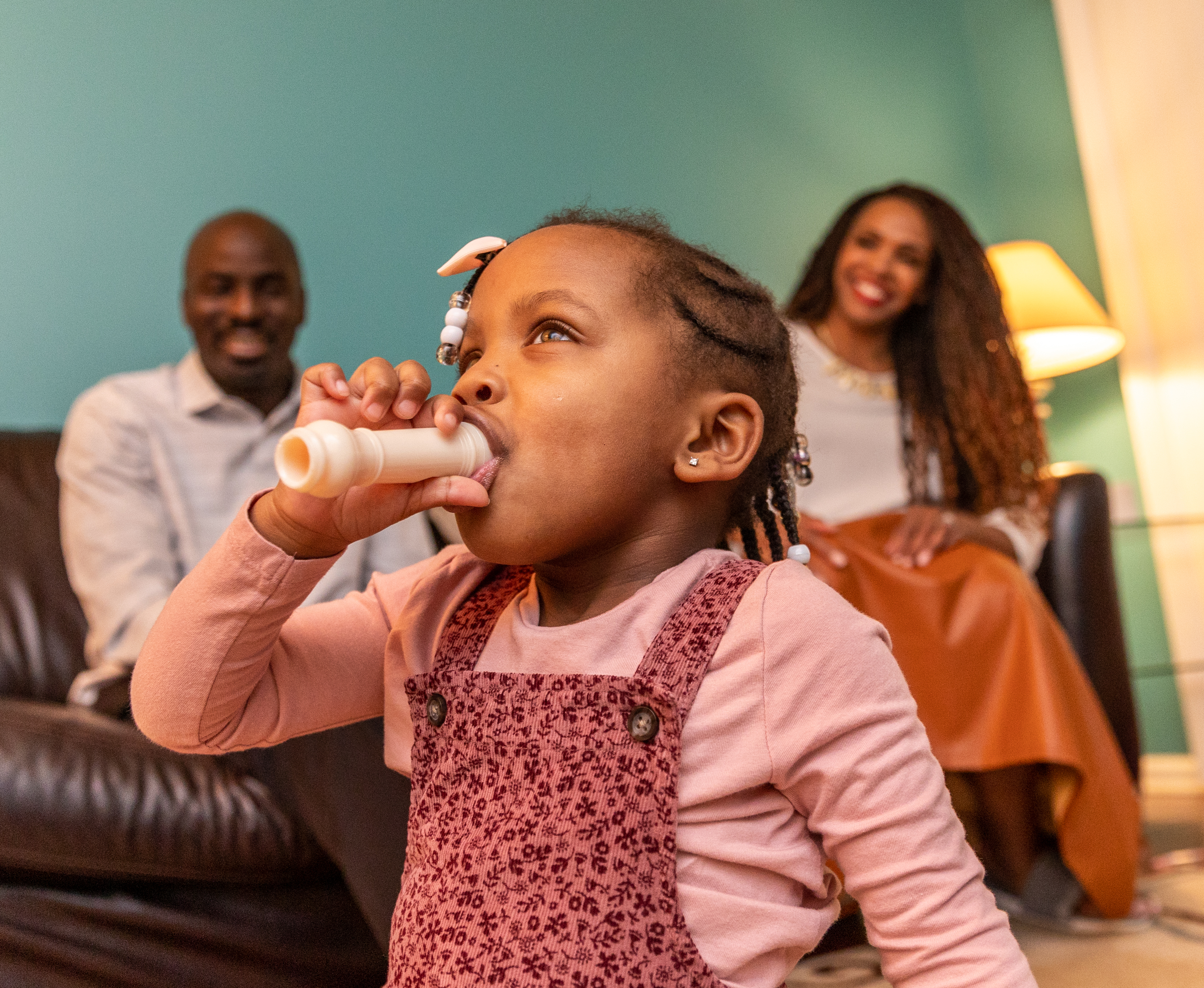 The McCown family is busy with their 2-year-old Priya McCowan, who turns three in early March and is leading an impromptu music jam session at their home Tuesday, Feb 8, 2022. Emanuel and Penelope McCowan struggled for years with fertility issues and Penelope now has a blog and a small business built to help others in her situation. (Jenni Girtman for The Atlanta Journal-Constitution)
