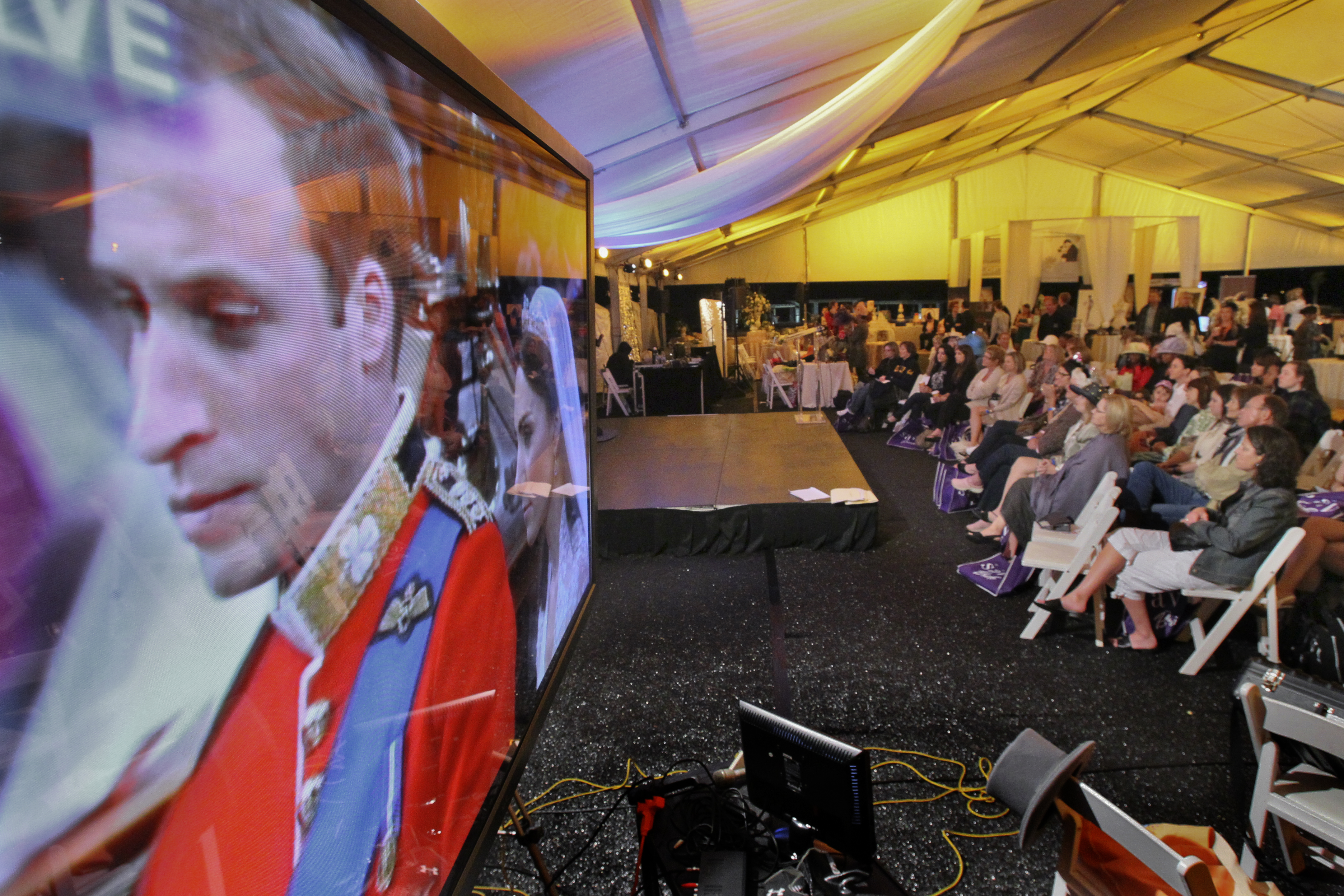 Prince William and Kate Middleton become man and wife in April 2011 while a crowd in Atlanta’s Piedmont Park watches the live broadcast on large screen TV's. John Spink, jspink@ajc.com