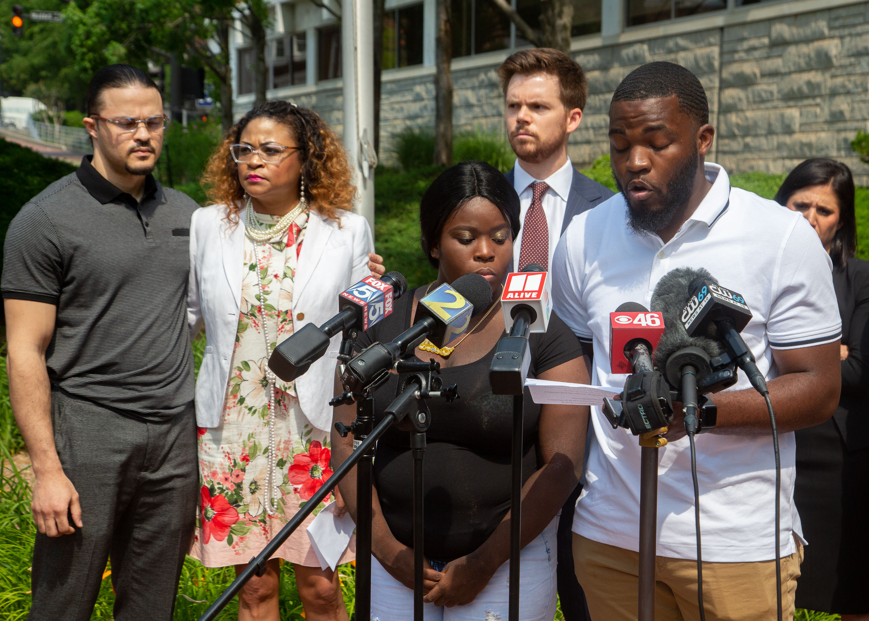 Johnny Bolton's son Kyrie Turner and daughter Diamond Bolton speak at a press conference in front of the Cobb County sheriff's office in Marietta on Tuesday, May 25, 2021. STEVE SCHAEFER FOR THE ATLANTA JOURNAL-CONSTITUTION