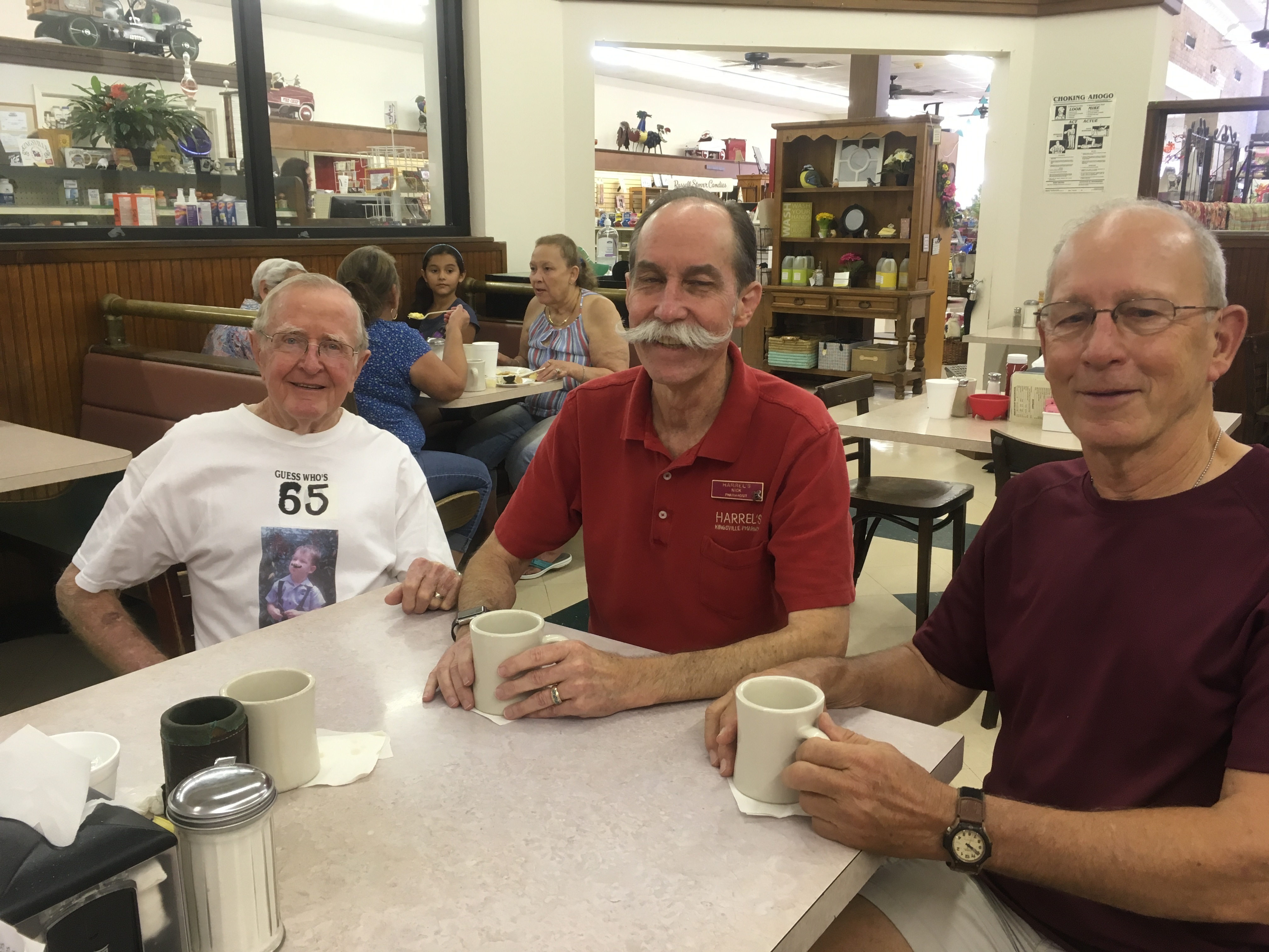 Clyde Allen, left, Nick Harrel and Hal Dantone at their regular downtown Kingsville, Tex. hangout. Photo: Jennifer Brett