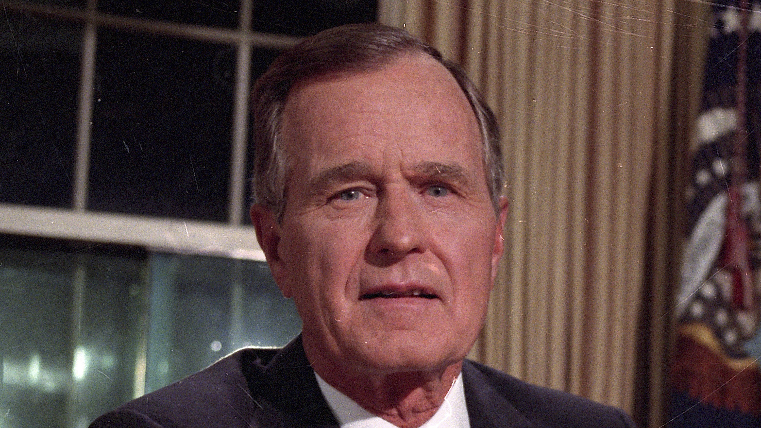 President George Bush (1989 File photo - AP Photo/Dennis Cook)
