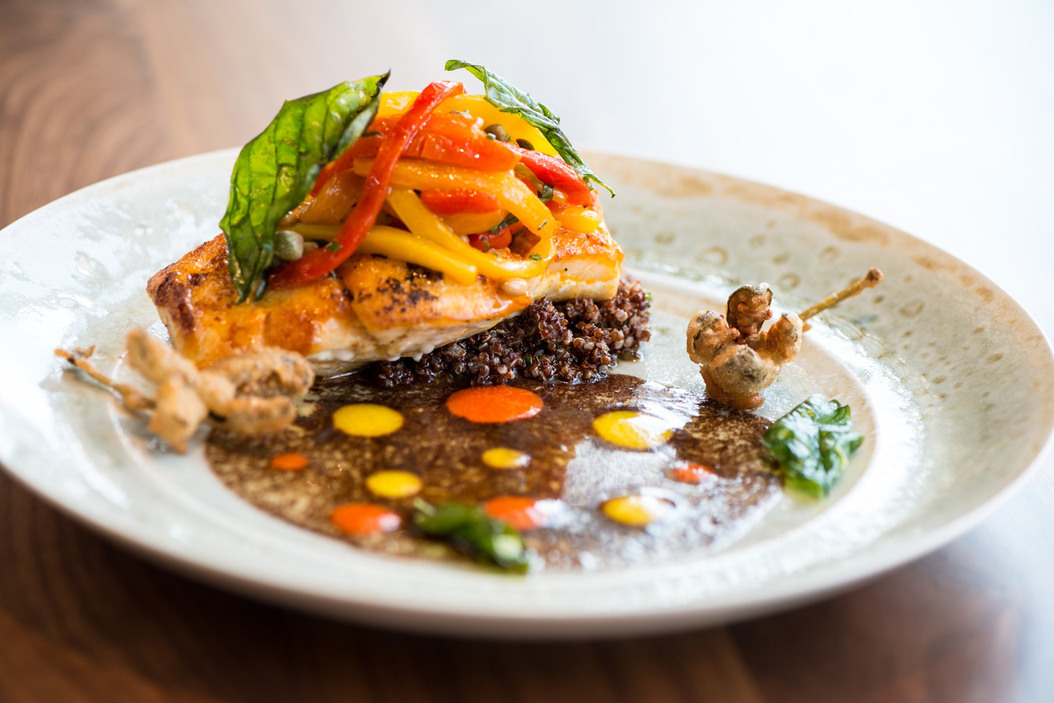 Florida Grouper with peperoni arrosto, black olive oil, pine nuts, caper, and broccoli. Photo credit- Mia Yakel.