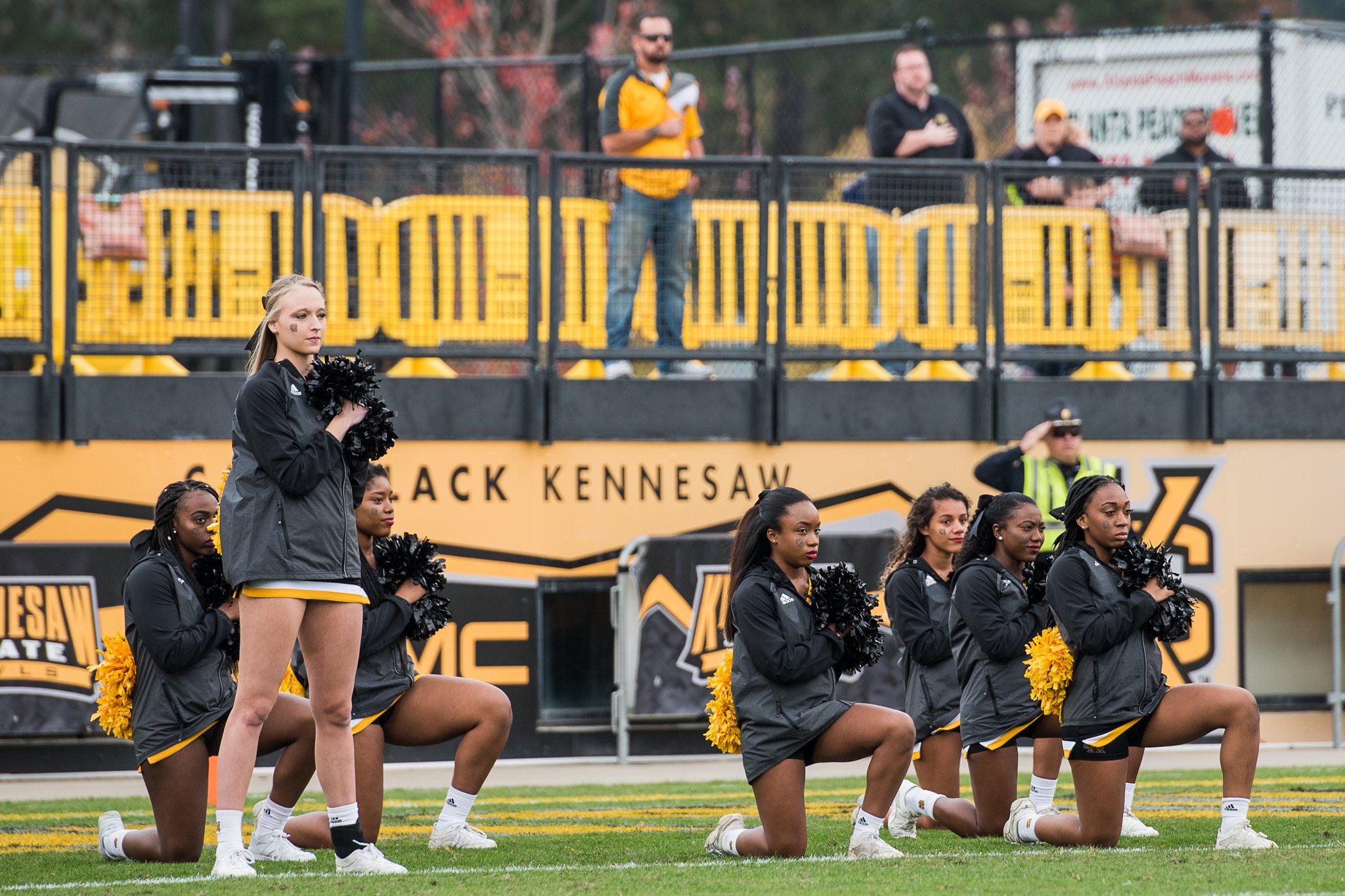 NFL cheerleader takes a knee during national anthem, News