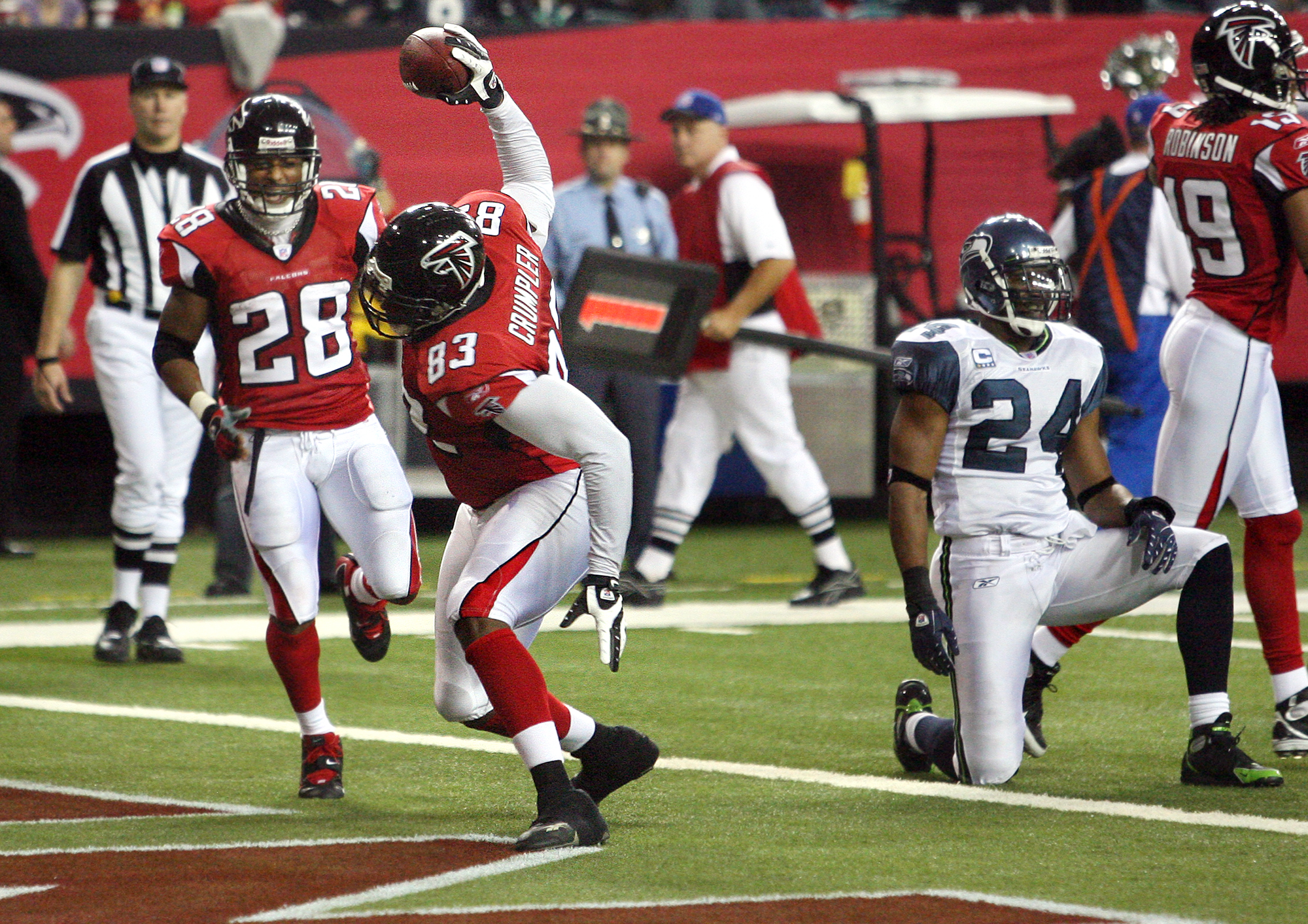 Tight end Alge Crumpler of the Atlanta Falcons walks off the field News  Photo - Getty Images