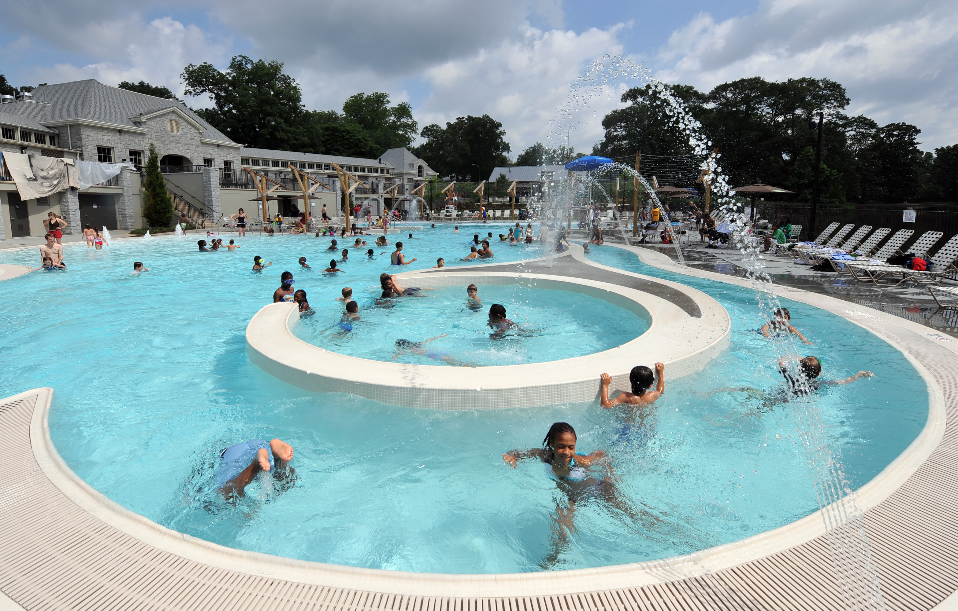 The Piedmont Park Aquatic Center features water spray, lap lanes, shallow wading section and a channel for floating. FILE PHOTO