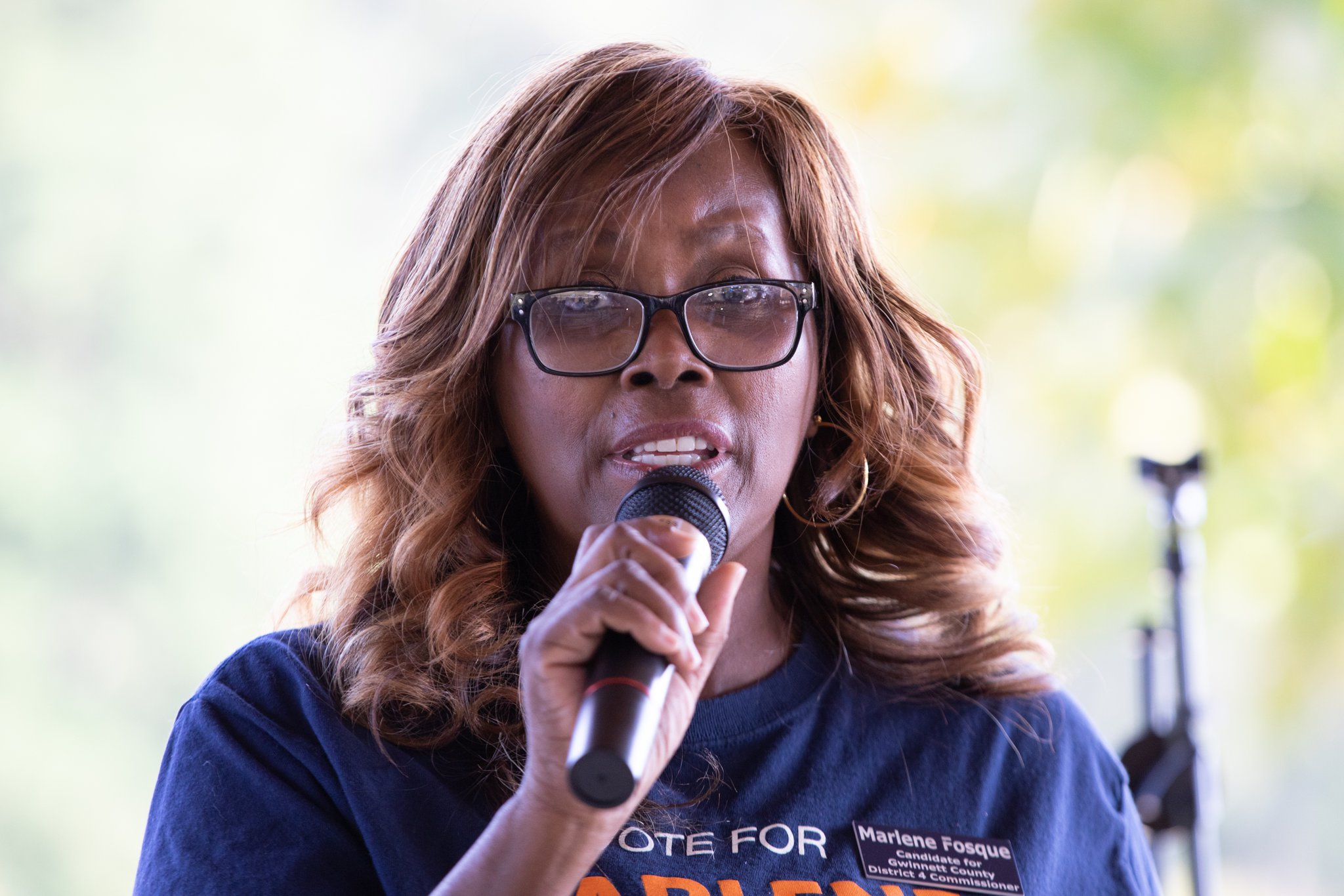 October 06, 2018 — Marlene Fosque, candidate for Gwinnett County Board of Commissioners, Georgia District 4, at a Donna McLeod rally in a park in Lawrenceville. (CREDIT: Dustin Chambers for AJC)