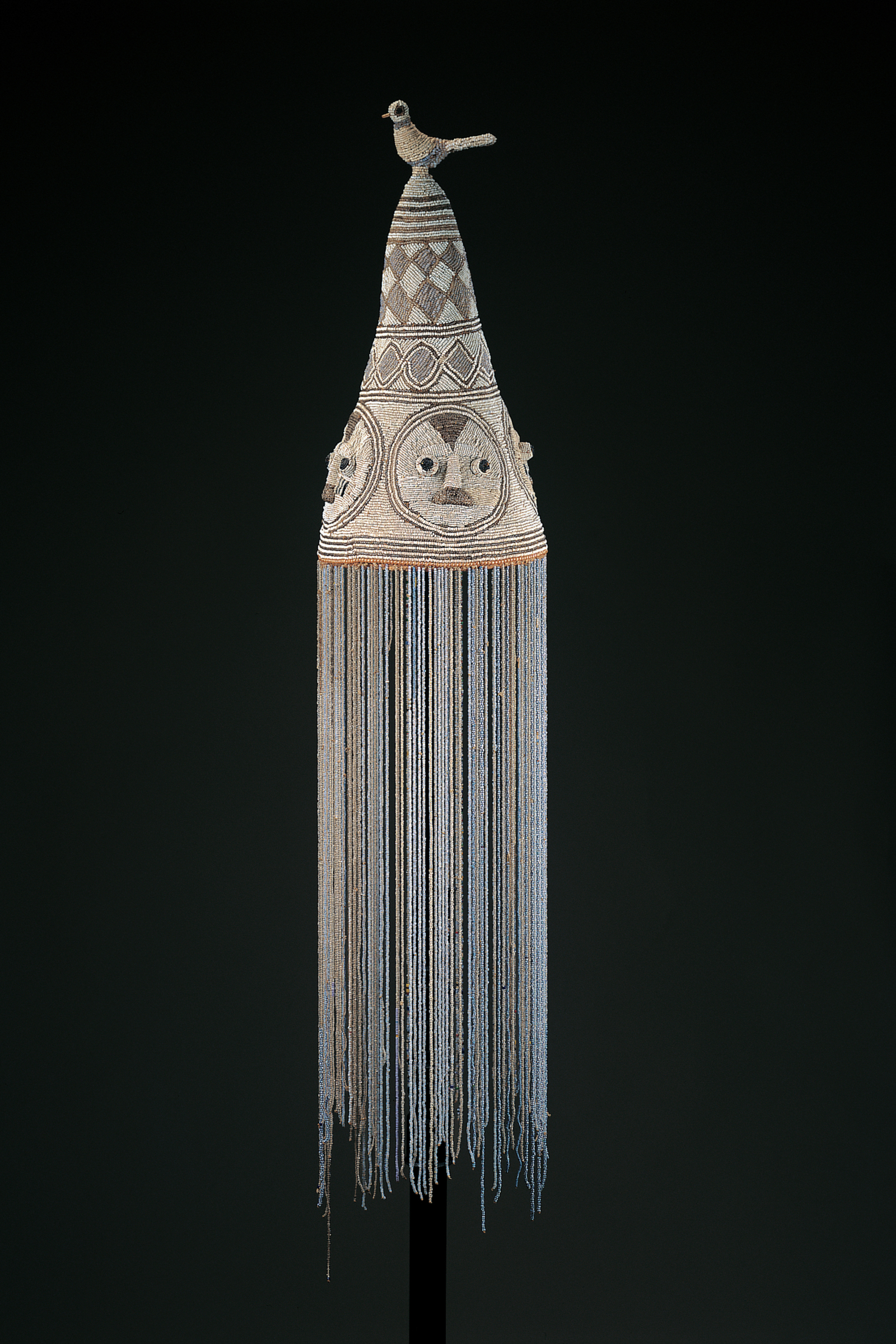 A Yoruba crown of Obatala or "king" made in the late 19th or early 20th-century, in Nigeria. The unknown artists were likely women who crafted the crown of glass beads, cloth, fiber and leather. Courtesy of the High Museum of Art