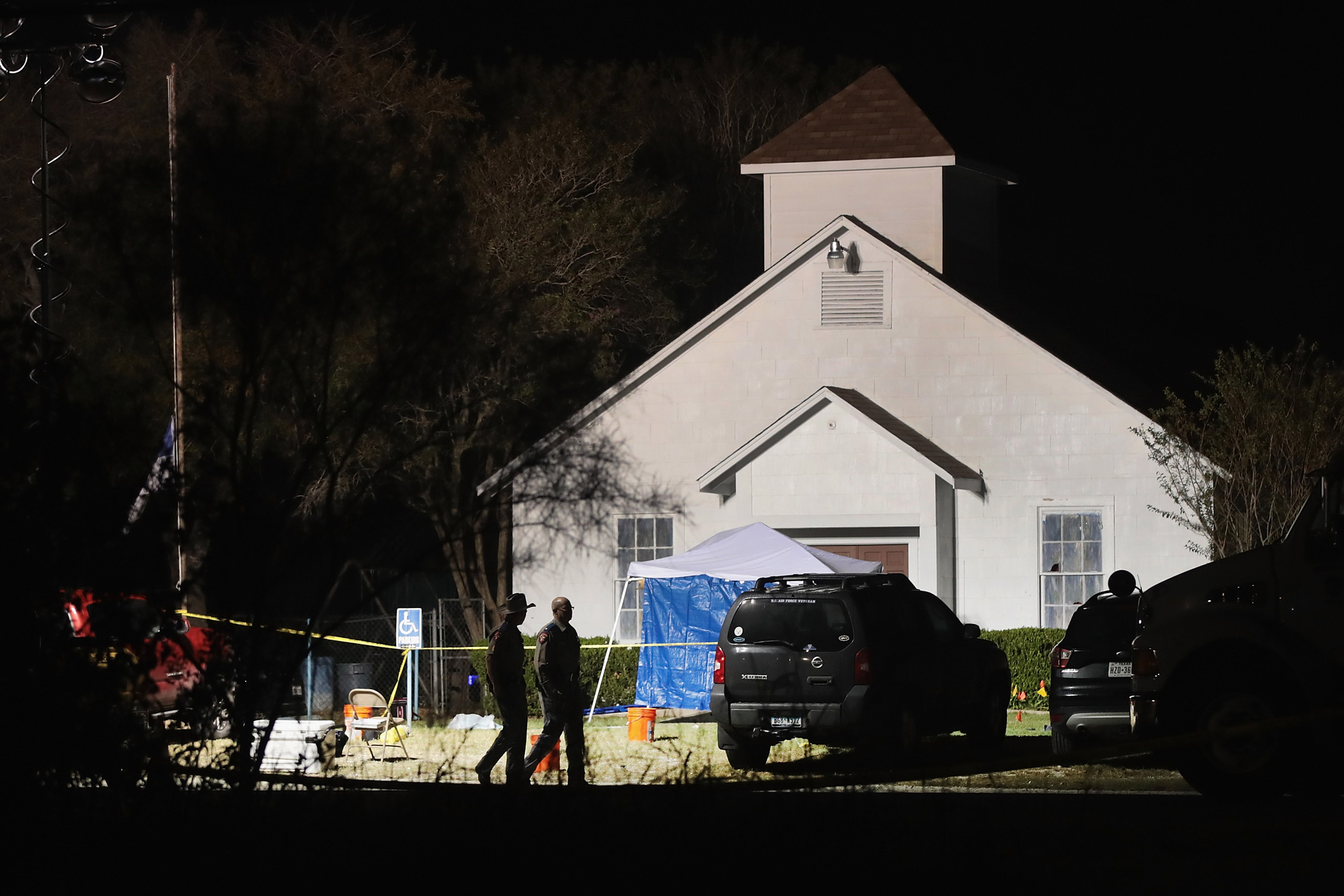 SUTHERLAND SPRINGS, TX - NOVEMBER 06: Law enforcement officials continue their investigation at First Baptist Church of Sutherland Springs during the early morning hours of November 6, 2017 in Sutherland Springs, Texas. Yesterday a gunman, Devin Patrick Kelly, killed 26 people at the church and wounded many more when he opened fire during a Sunday service. (Photo by Scott Olson/Getty Images)