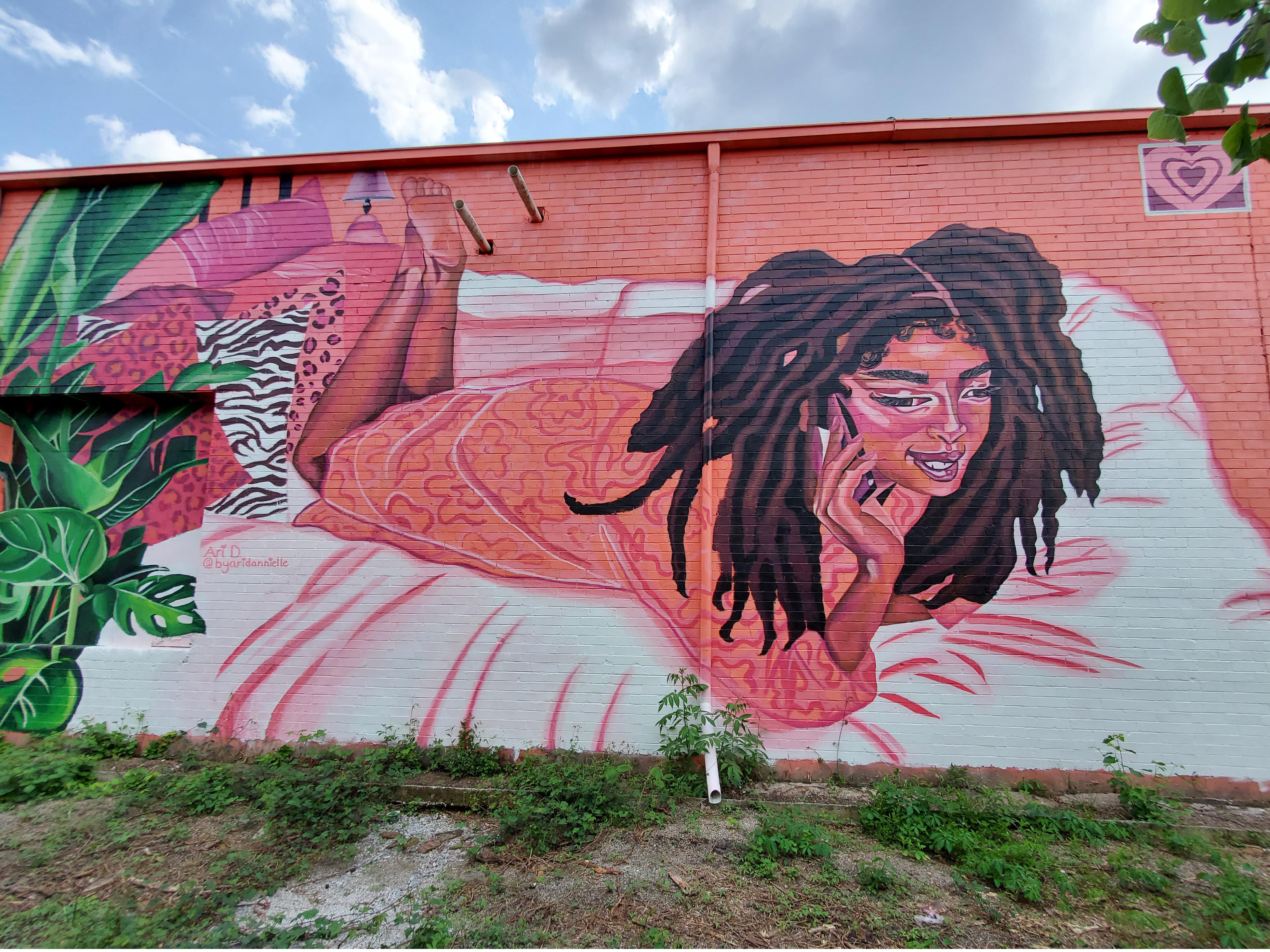 Ariel Daniel tells a positive story of a black woman's daily life in her mural 