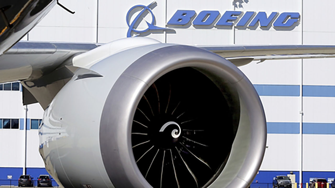 FILE - In this Tuesday, Feb. 16, 2016 file photo, An engine and part of a wing from the 100th 787 Dreamliner to be built at Boeing of South Carolina's North Charleston, S.C., facility are seen outside the plant. The morning round of voting has concluded Wednesday, Feb. 15, 2017, among South Carolina Boeing workers considering if they want representation by a union. Nearly 3,000 production workers are eligible to vote in the election to determine if they'll be represented by the International Association of Machinists and Aerospace Workers. (Brad Nettles/The Post and Courier via AP, File)