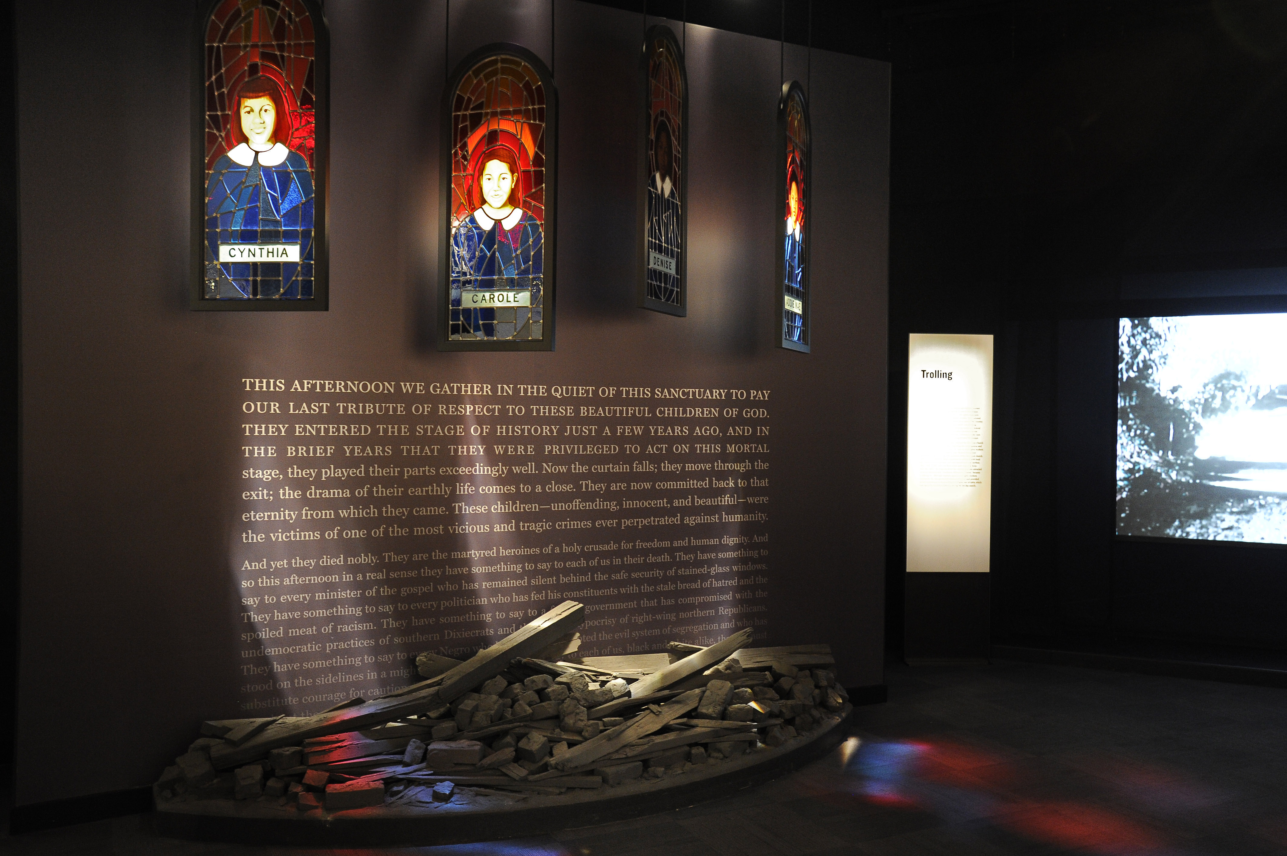 The National Center for Civil and Human Rights in Atlanta features a tribute to the four girls, who are represented in stained-glass portraits. (David Tulis / AJC Special)
